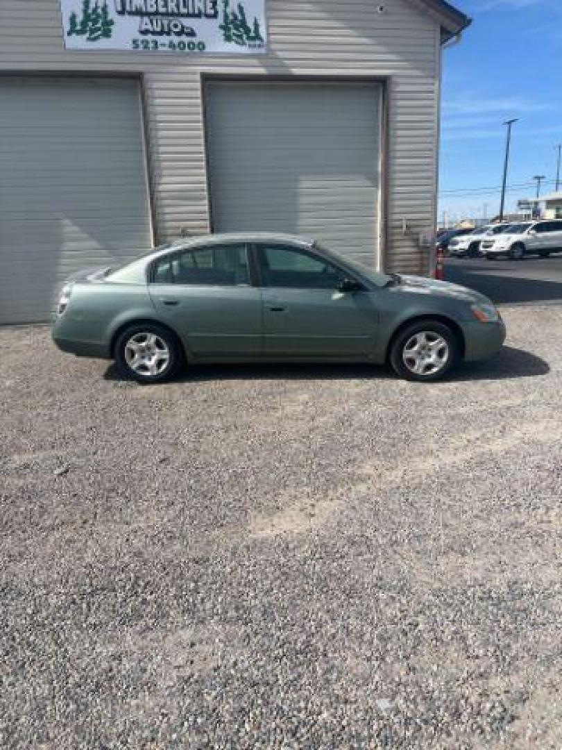 2003 GREEN /Charcoal Nissan Altima 2.5 S (1N4AL11D03C) with an 2.5L I-4 DOHC engine, AUTOMATIC transmission, located at 1235 N Woodruff Ave., Idaho Falls, 83401, (208) 523-1053, 43.507172, -112.000488 - At Timberline Auto, finding a great deal on your next vehicle is always easy! Our experienced sales staff's goal is to help find you the right vehicle at the right price! Our knowledgeable finance department has options for almost any credit score. We offer extended service contract options to prote - Photo#1