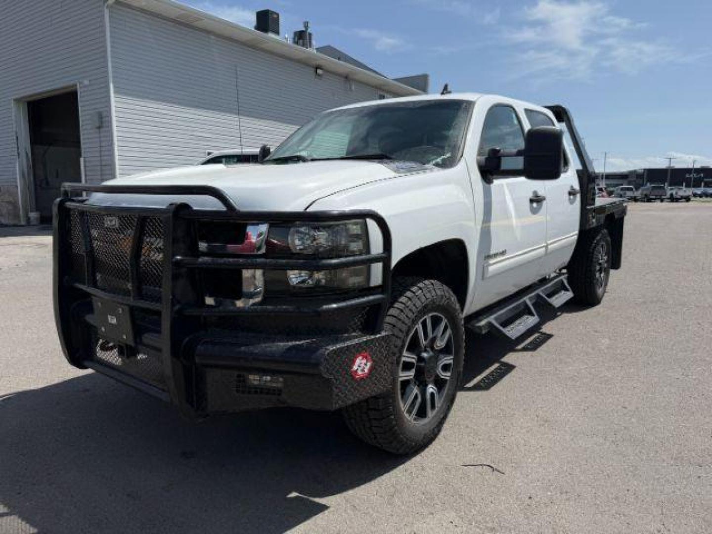 2014 Summit White /Ebony Chevrolet Silverado 2500HD (1GC1KXC84EF) with an Duramax 66L V-8 diesel direct injection engine, Automatic transmission, located at 1175 N Woodruff Ave, Idaho Falls, ID, 83401, 43.506901, -111.999657 - At Timberline Auto, finding a great deal on your next vehicle is always easy! Our experienced sales staff's goal is to help find you the right vehicle at the right price! Our knowledgeable finance department has options for almost any credit score. We offer extended service contract options to prote - Photo#0
