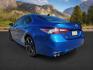 2018 Blue Streak Metallic /Black Toyota Camry (4T1BZ1HK0JU) with an 35L V-6 portdirect injection engine, Automatic transmission, located at 1175 N Woodruff Ave, Idaho Falls, ID, 83401, 43.506901, -111.999657 - At Timberline Auto, finding a great deal on your next vehicle is always easy! Our experienced sales staff's goal is to help find you the right vehicle at the right price! Our knowledgeable finance department has options for almost any credit score. We offer extended service contract options to prote - Photo#2