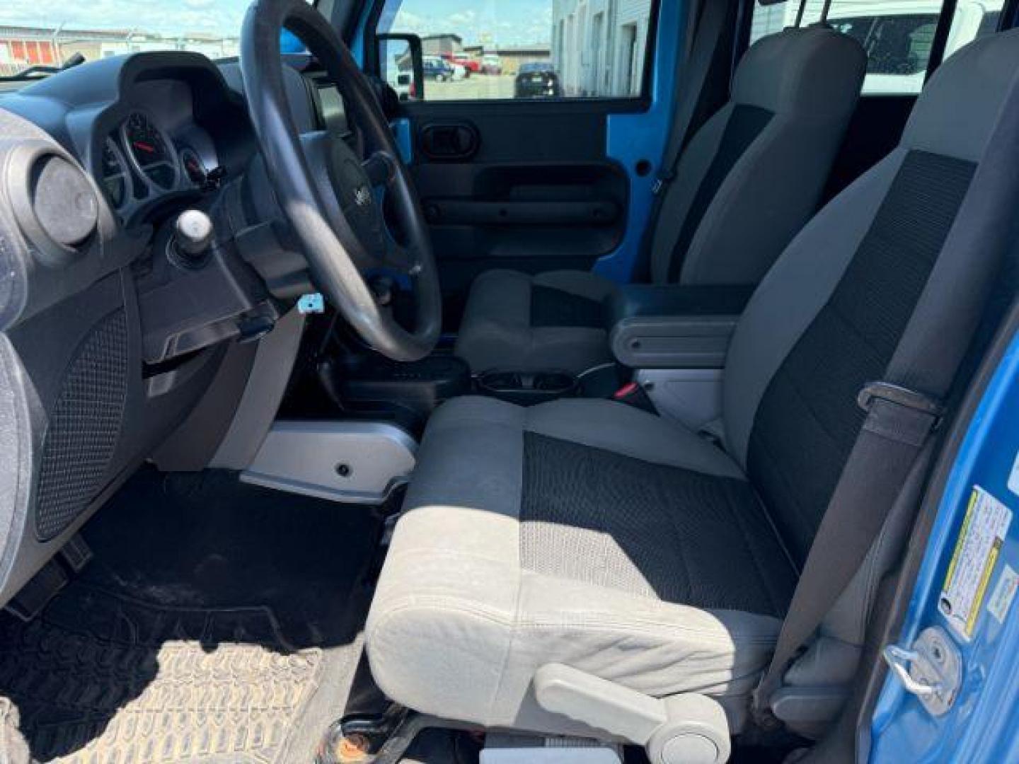 2010 BLUE /Dark Slate Gray/Med Slate Gray Jeep Wrangler Unlimited (1J4BA3H18AL) with an 38L V-6 regular unleaded engine, Automatic transmission, located at 1175 N Woodruff Ave, Idaho Falls, ID, 83401, 43.506901, -111.999657 - At Timberline Auto, finding a great deal on your next vehicle is always easy! Our experienced sales staff's goal is to help find you the right vehicle at the right price! Our knowledgeable finance department has options for almost any credit score. We offer extended service contract options to prote - Photo#26