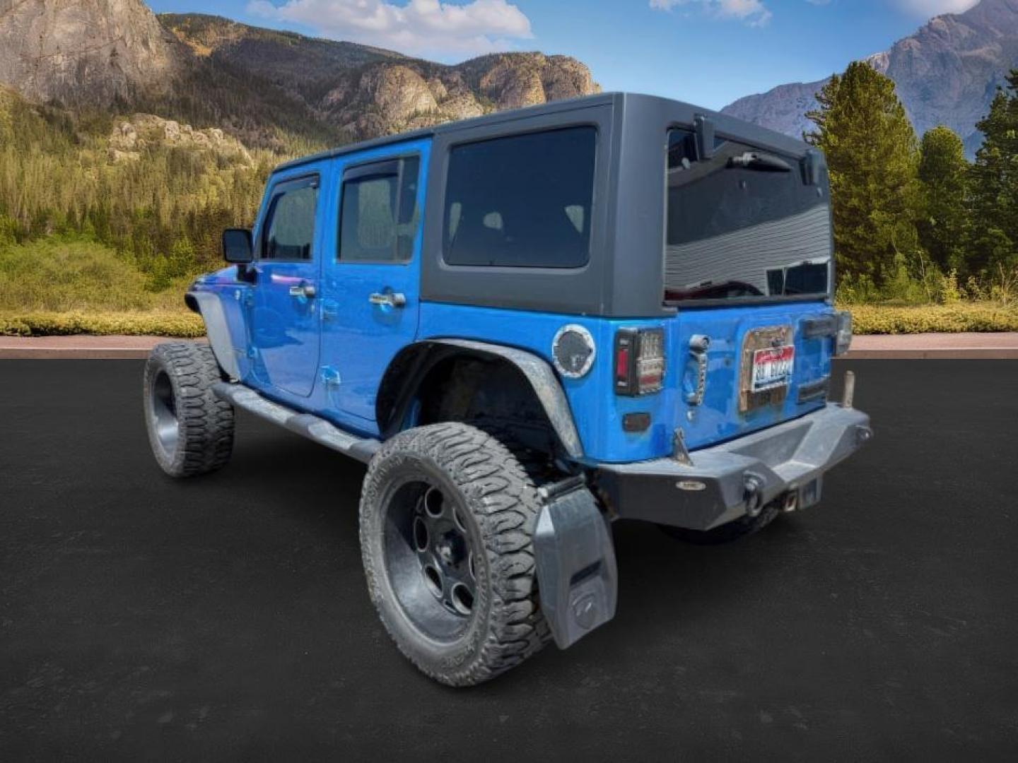 2010 BLUE /Dark Slate Gray/Med Slate Gray Jeep Wrangler Unlimited (1J4BA3H18AL) with an 38L V-6 regular unleaded engine, Automatic transmission, located at 1175 N Woodruff Ave, Idaho Falls, ID, 83401, 43.506901, -111.999657 - At Timberline Auto, finding a great deal on your next vehicle is always easy! Our experienced sales staff's goal is to help find you the right vehicle at the right price! Our knowledgeable finance department has options for almost any credit score. We offer extended service contract options to prote - Photo#2
