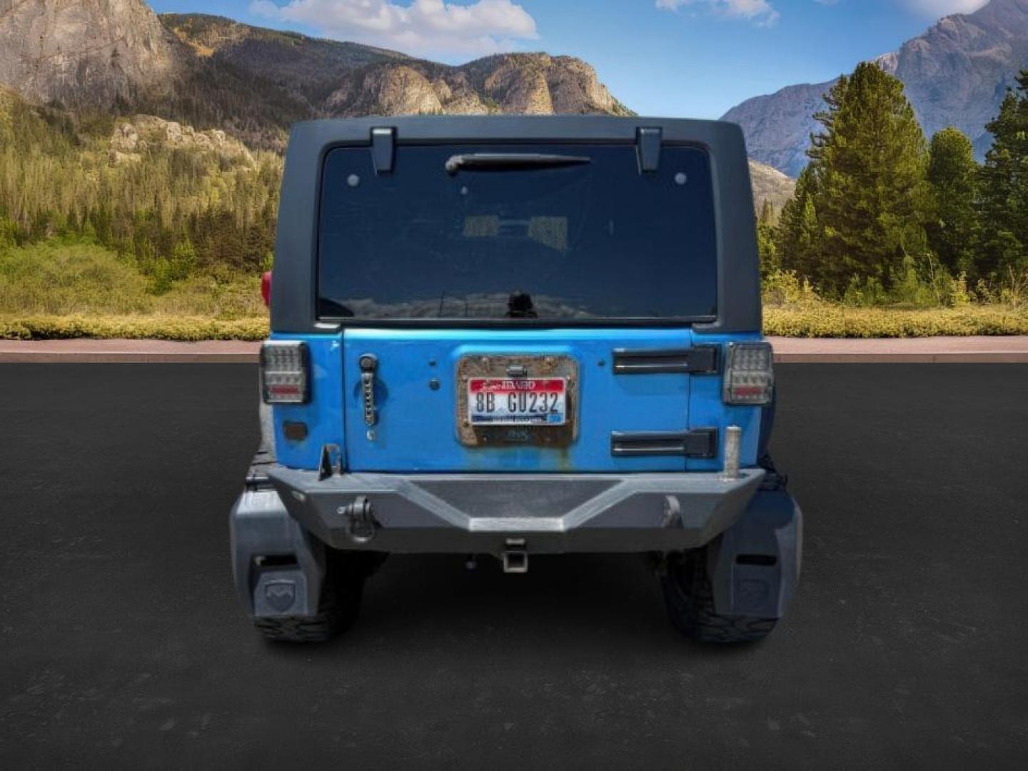 2010 BLUE /Dark Slate Gray/Med Slate Gray Jeep Wrangler Unlimited (1J4BA3H18AL) with an 38L V-6 regular unleaded engine, Automatic transmission, located at 1175 N Woodruff Ave, Idaho Falls, ID, 83401, 43.506901, -111.999657 - At Timberline Auto, finding a great deal on your next vehicle is always easy! Our experienced sales staff's goal is to help find you the right vehicle at the right price! Our knowledgeable finance department has options for almost any credit score. We offer extended service contract options to prote - Photo#3
