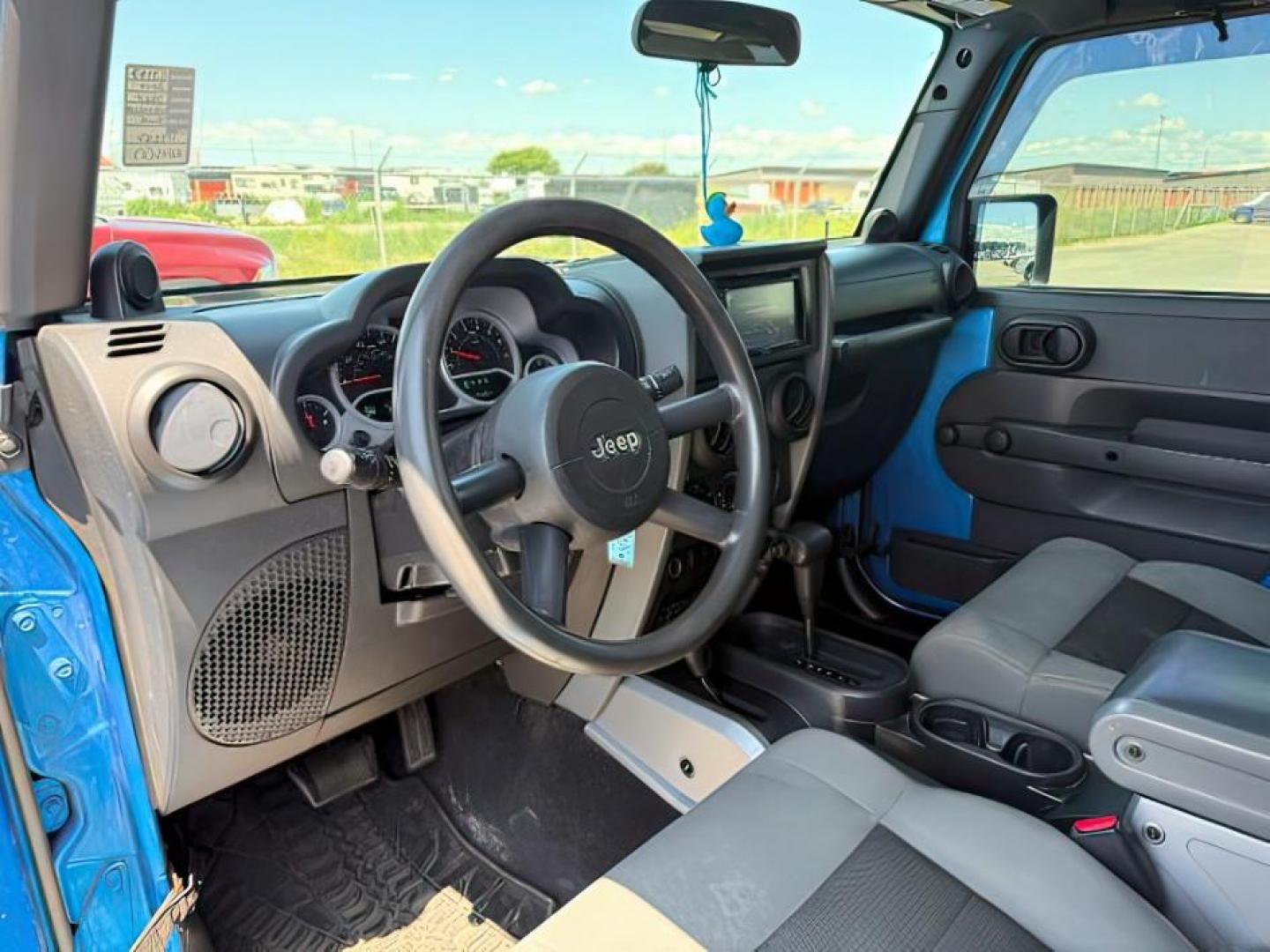 2010 BLUE /Dark Slate Gray/Med Slate Gray Jeep Wrangler Unlimited (1J4BA3H18AL) with an 38L V-6 regular unleaded engine, Automatic transmission, located at 1175 N Woodruff Ave, Idaho Falls, ID, 83401, 43.506901, -111.999657 - At Timberline Auto, finding a great deal on your next vehicle is always easy! Our experienced sales staff's goal is to help find you the right vehicle at the right price! Our knowledgeable finance department has options for almost any credit score. We offer extended service contract options to prote - Photo#10