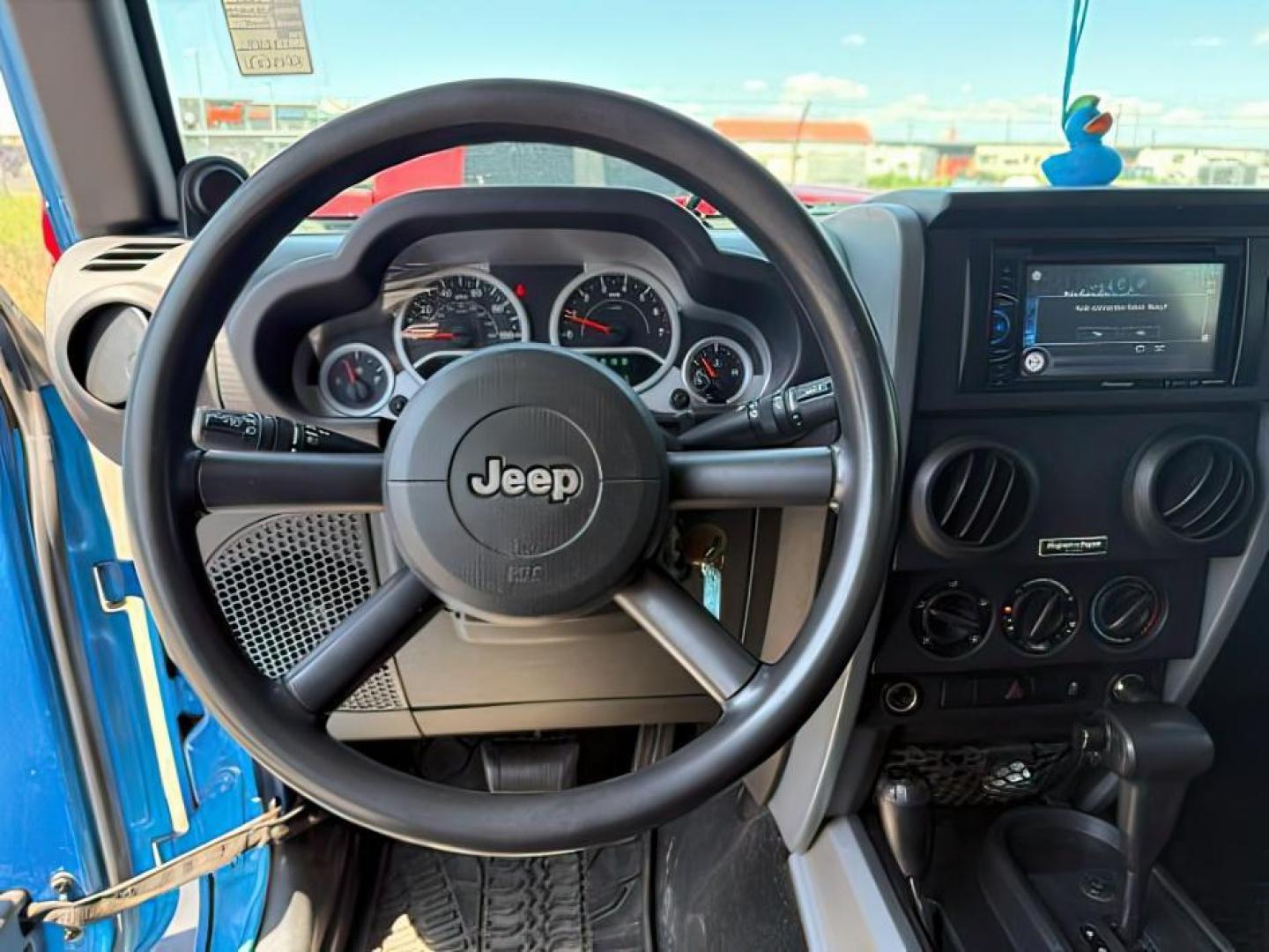 2010 BLUE /Dark Slate Gray/Med Slate Gray Jeep Wrangler Unlimited (1J4BA3H18AL) with an 38L V-6 regular unleaded engine, Automatic transmission, located at 1175 N Woodruff Ave, Idaho Falls, ID, 83401, 43.506901, -111.999657 - At Timberline Auto, finding a great deal on your next vehicle is always easy! Our experienced sales staff's goal is to help find you the right vehicle at the right price! Our knowledgeable finance department has options for almost any credit score. We offer extended service contract options to prote - Photo#11