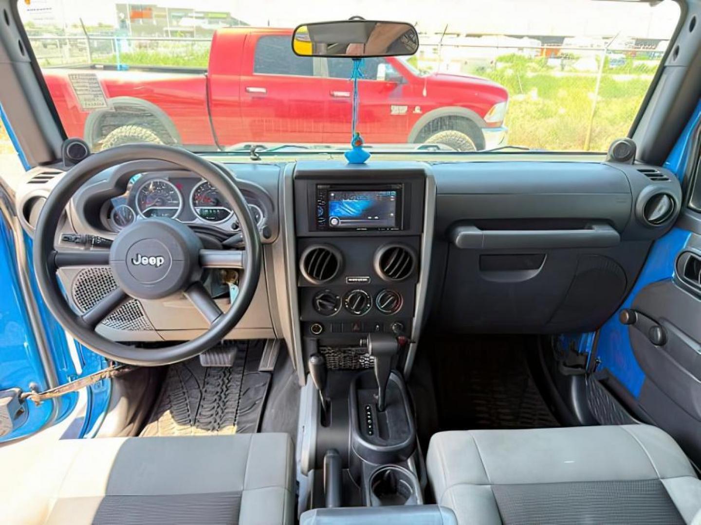 2010 BLUE /Dark Slate Gray/Med Slate Gray Jeep Wrangler Unlimited (1J4BA3H18AL) with an 38L V-6 regular unleaded engine, Automatic transmission, located at 1175 N Woodruff Ave, Idaho Falls, ID, 83401, 43.506901, -111.999657 - At Timberline Auto, finding a great deal on your next vehicle is always easy! Our experienced sales staff's goal is to help find you the right vehicle at the right price! Our knowledgeable finance department has options for almost any credit score. We offer extended service contract options to prote - Photo#15
