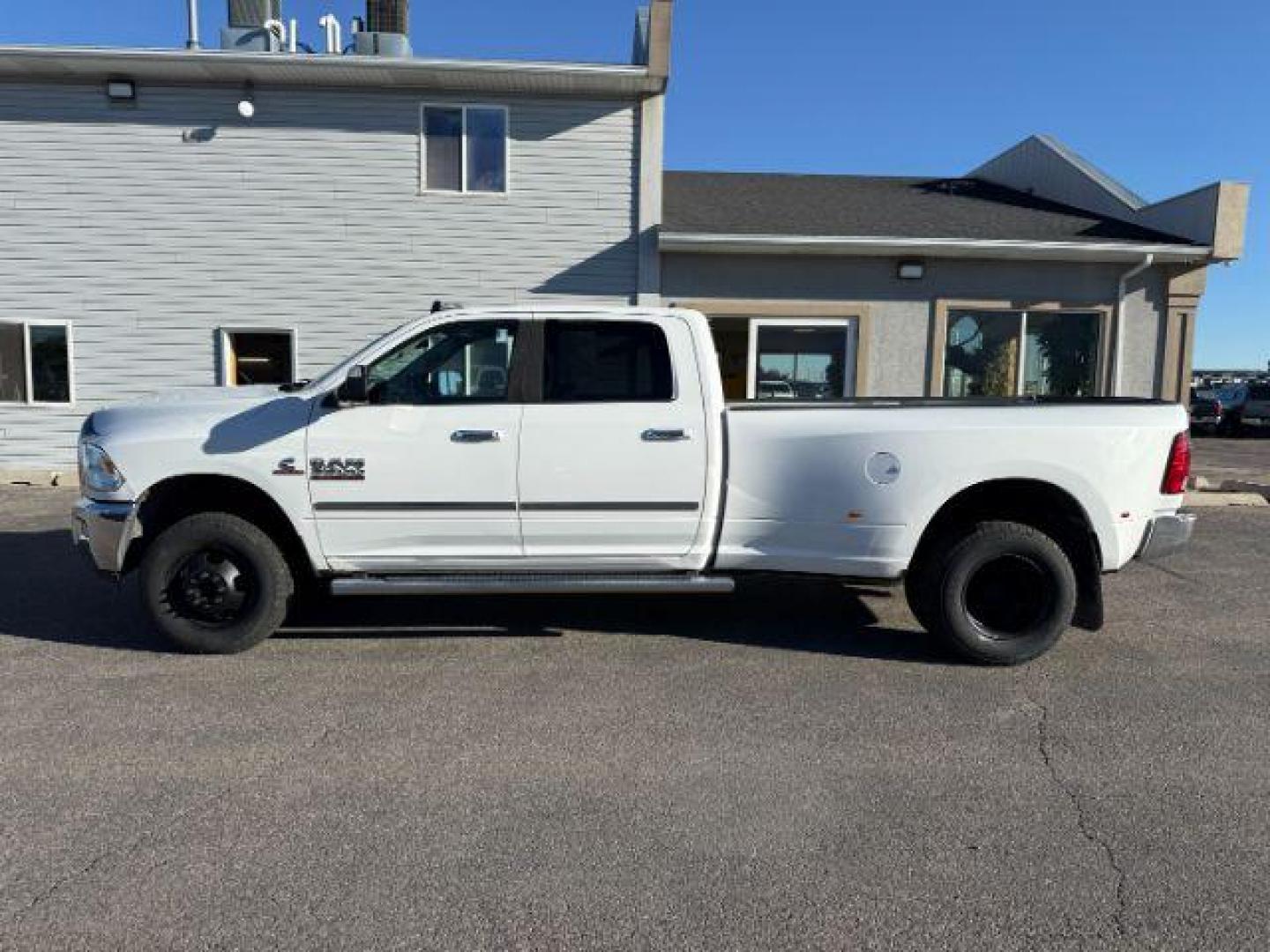2016 Bright White Clearcoat /Diesel Gray/Black Ram 3500 (3C63RRHL8GG) with an 67L engine, Automatic transmission, located at 1175 N Woodruff Ave, Idaho Falls, ID, 83401, 43.506901, -111.999657 - At Timberline Auto, finding a great deal on your next vehicle is always easy! Our experienced sales staff's goal is to help find you the right vehicle at the right price! Our knowledgeable finance department has options for almost any credit score. We offer extended service contract options to prote - Photo#24