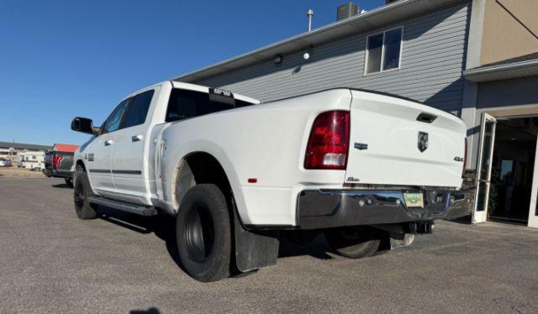 2016 Bright White Clearcoat /Diesel Gray/Black Ram 3500 (3C63RRHL8GG) with an 67L engine, Automatic transmission, located at 1175 N Woodruff Ave, Idaho Falls, ID, 83401, 43.506901, -111.999657 - At Timberline Auto, finding a great deal on your next vehicle is always easy! Our experienced sales staff's goal is to help find you the right vehicle at the right price! Our knowledgeable finance department has options for almost any credit score. We offer extended service contract options to prote - Photo#25