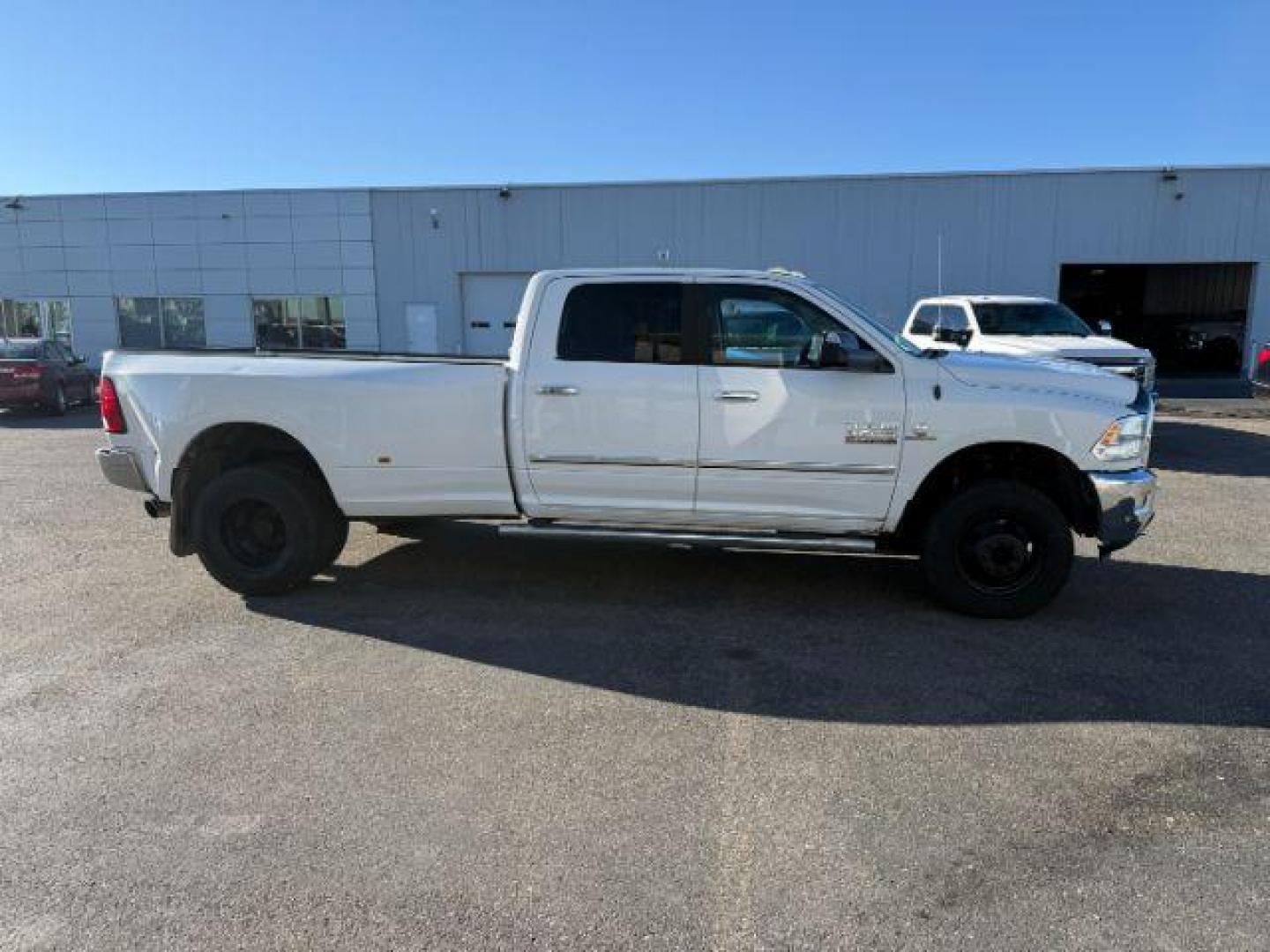 2016 Bright White Clearcoat /Diesel Gray/Black Ram 3500 (3C63RRHL8GG) with an 67L engine, Automatic transmission, located at 1175 N Woodruff Ave, Idaho Falls, ID, 83401, 43.506901, -111.999657 - At Timberline Auto, finding a great deal on your next vehicle is always easy! Our experienced sales staff's goal is to help find you the right vehicle at the right price! Our knowledgeable finance department has options for almost any credit score. We offer extended service contract options to prote - Photo#27