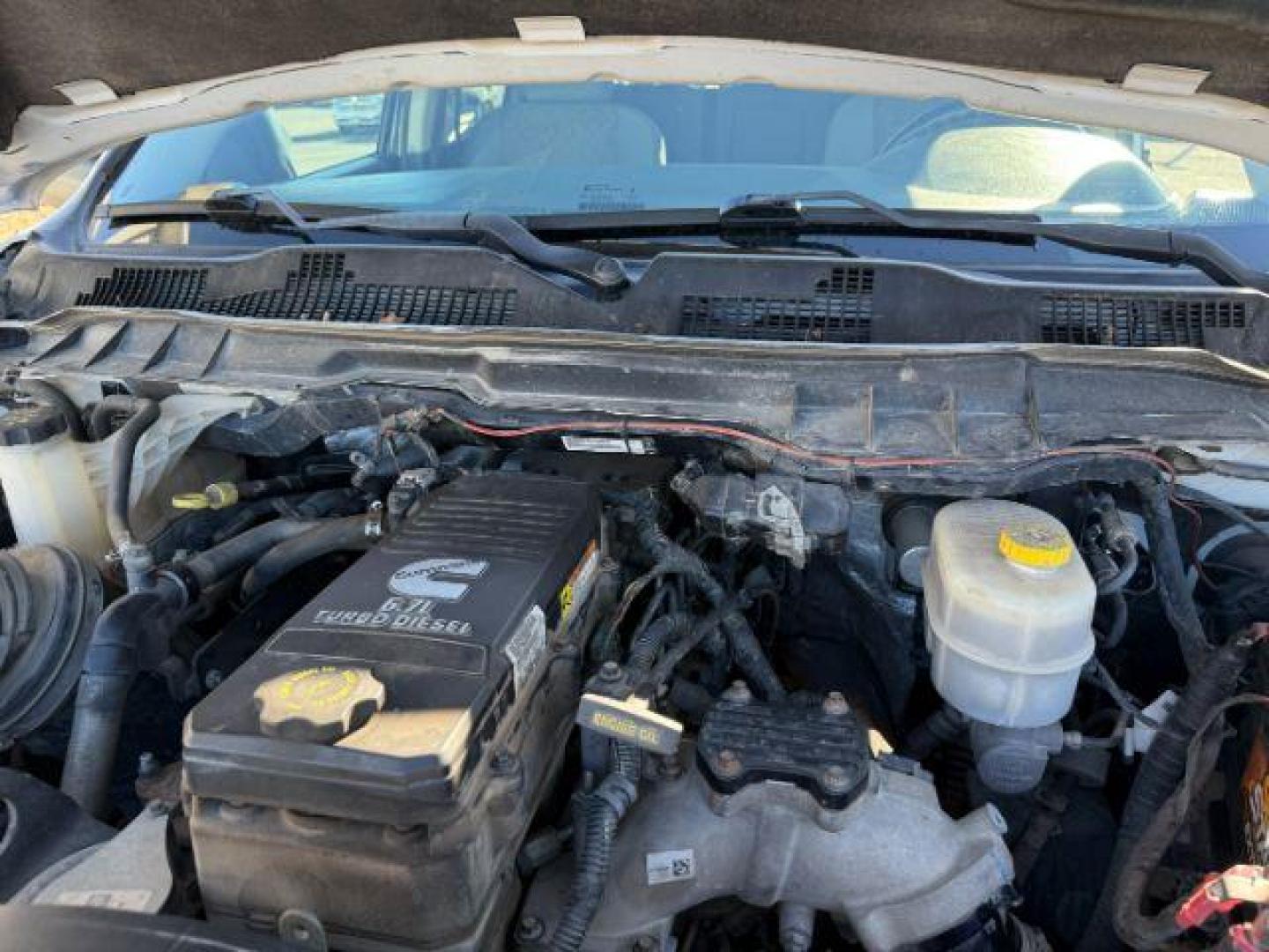 2016 Bright White Clearcoat /Diesel Gray/Black Ram 3500 (3C63RRHL8GG) with an 67L engine, Automatic transmission, located at 1175 N Woodruff Ave, Idaho Falls, ID, 83401, 43.506901, -111.999657 - At Timberline Auto, finding a great deal on your next vehicle is always easy! Our experienced sales staff's goal is to help find you the right vehicle at the right price! Our knowledgeable finance department has options for almost any credit score. We offer extended service contract options to prote - Photo#45