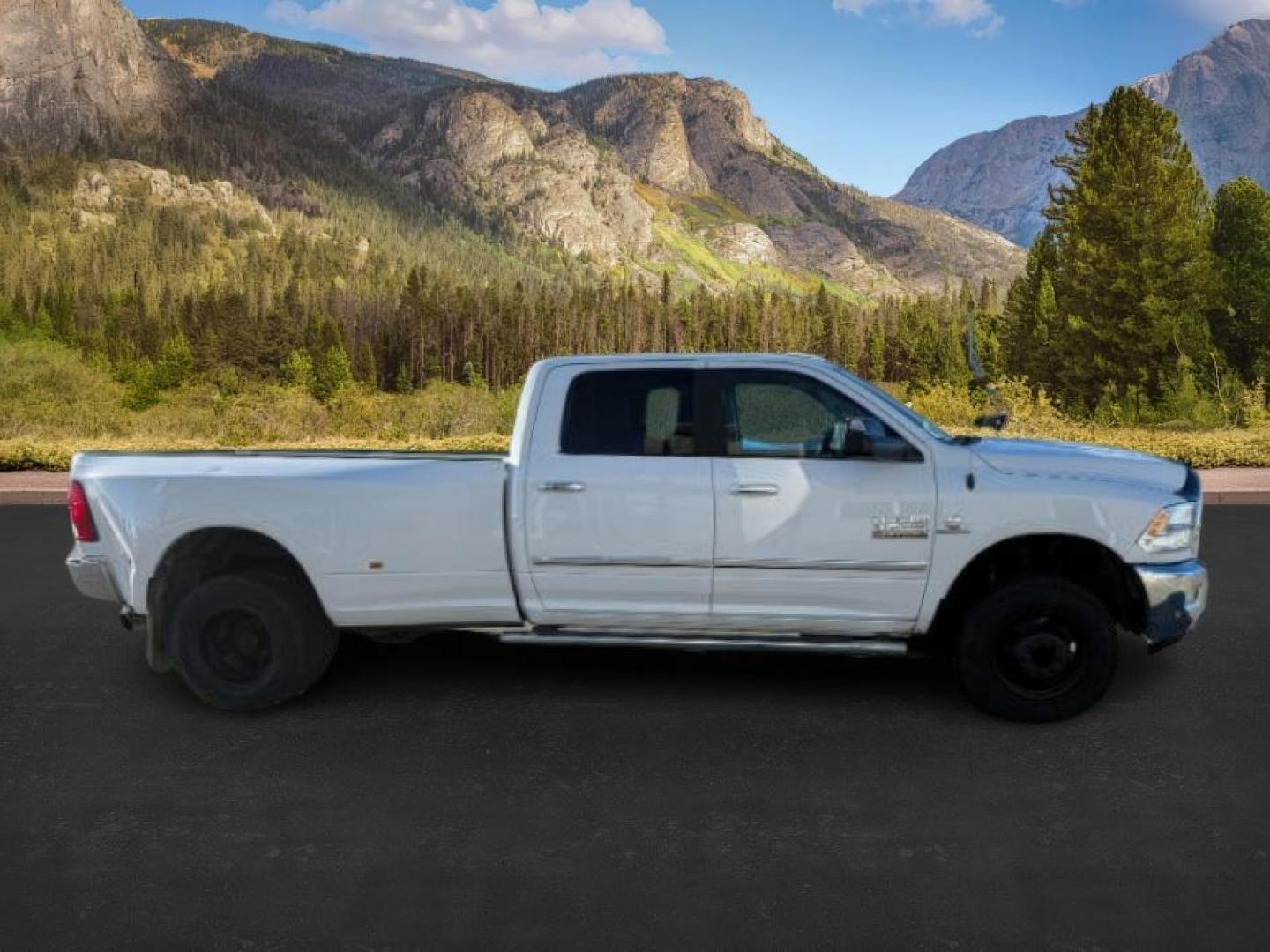 2016 Bright White Clearcoat /Diesel Gray/Black Ram 3500 (3C63RRHL8GG) with an 67L engine, Automatic transmission, located at 1175 N Woodruff Ave, Idaho Falls, ID, 83401, 43.506901, -111.999657 - At Timberline Auto, finding a great deal on your next vehicle is always easy! Our experienced sales staff's goal is to help find you the right vehicle at the right price! Our knowledgeable finance department has options for almost any credit score. We offer extended service contract options to prote - Photo#4