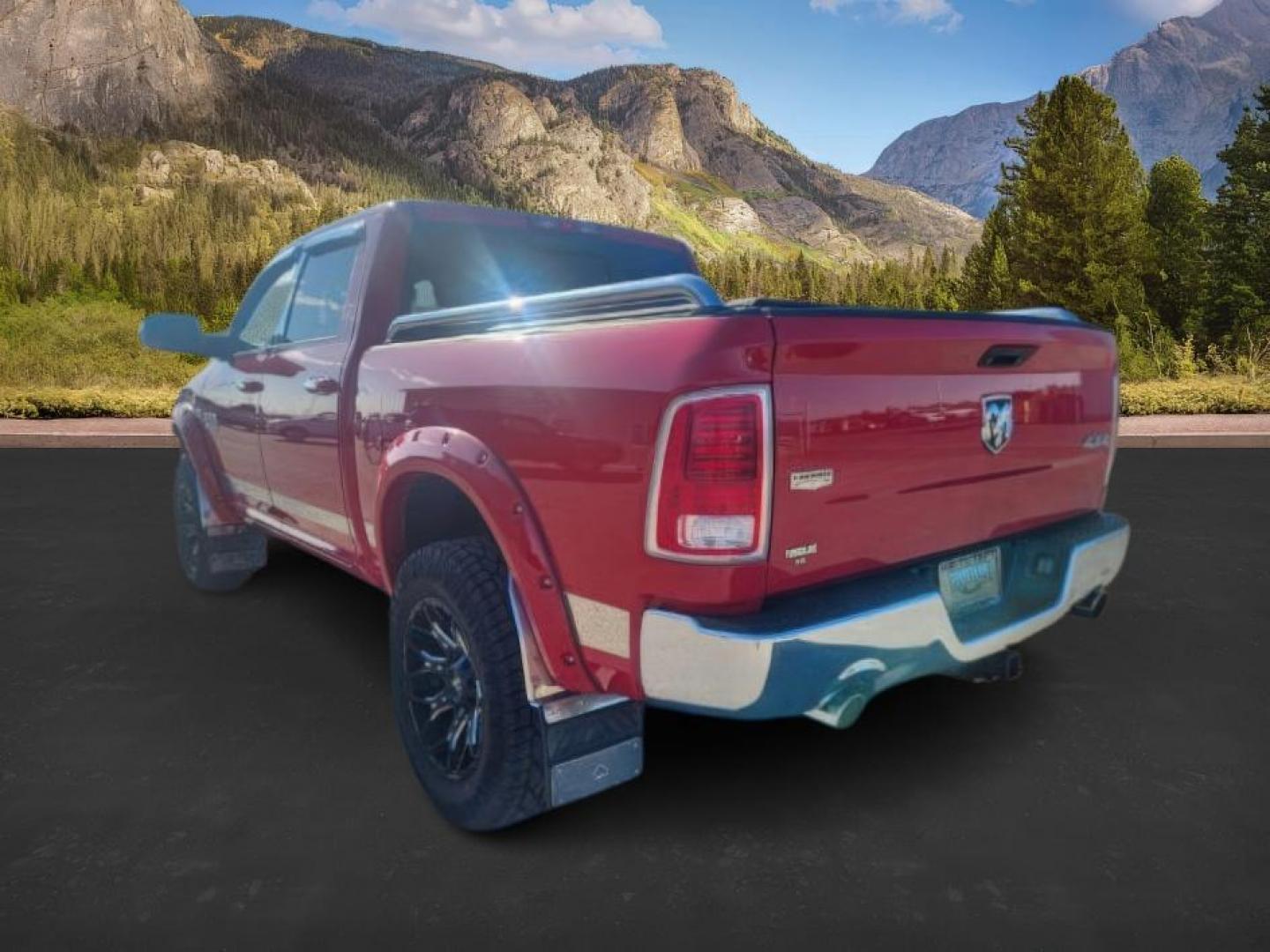 2014 RED /BLACK RAM 1500 LARAMIE (1C6RR7NT4ES) with an 5.7 engine, AUTOMATIC transmission, located at 1235 N Woodruff Ave., Idaho Falls, 83401, (208) 523-1053, 43.507172, -112.000488 - At Timberline Auto, finding a great deal on your next vehicle is always easy! Our experienced sales staff's goal is to help find you the right vehicle at the right price! Our knowledgeable finance department has options for almost any credit score. We offer extended service contract options to prote - Photo#2