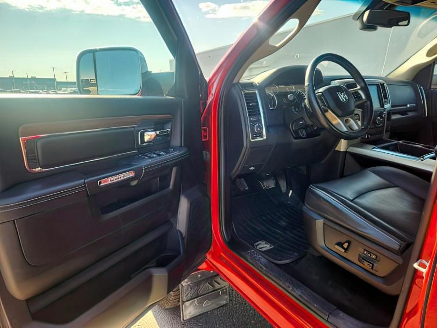 2014 RED /BLACK RAM 1500 LARAMIE (1C6RR7NT4ES) with an 5.7 engine, AUTOMATIC transmission, located at 1235 N Woodruff Ave., Idaho Falls, 83401, (208) 523-1053, 43.507172, -112.000488 - At Timberline Auto, finding a great deal on your next vehicle is always easy! Our experienced sales staff's goal is to help find you the right vehicle at the right price! Our knowledgeable finance department has options for almost any credit score. We offer extended service contract options to prote - Photo#10