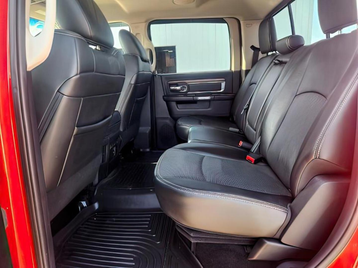 2014 RED /BLACK RAM 1500 LARAMIE (1C6RR7NT4ES) with an 5.7 engine, AUTOMATIC transmission, located at 1235 N Woodruff Ave., Idaho Falls, 83401, (208) 523-1053, 43.507172, -112.000488 - At Timberline Auto, finding a great deal on your next vehicle is always easy! Our experienced sales staff's goal is to help find you the right vehicle at the right price! Our knowledgeable finance department has options for almost any credit score. We offer extended service contract options to prote - Photo#12