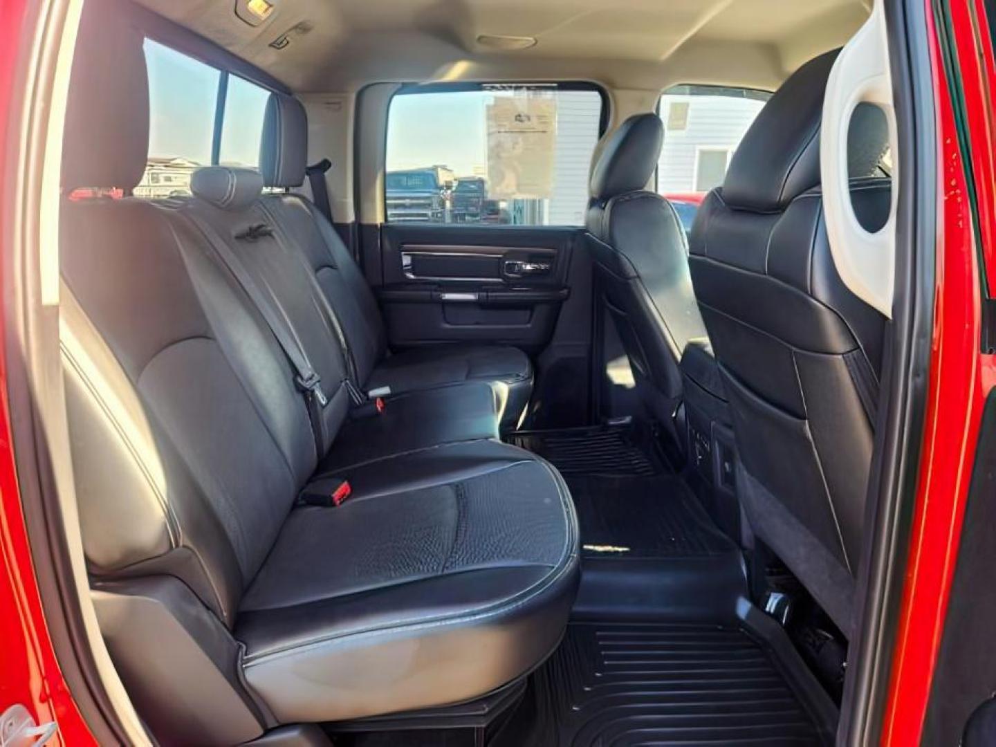 2014 RED /BLACK RAM 1500 LARAMIE (1C6RR7NT4ES) with an 5.7 engine, AUTOMATIC transmission, located at 1235 N Woodruff Ave., Idaho Falls, 83401, (208) 523-1053, 43.507172, -112.000488 - At Timberline Auto, finding a great deal on your next vehicle is always easy! Our experienced sales staff's goal is to help find you the right vehicle at the right price! Our knowledgeable finance department has options for almost any credit score. We offer extended service contract options to prote - Photo#13