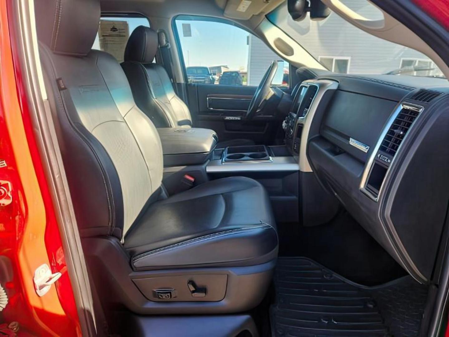 2014 RED /BLACK RAM 1500 LARAMIE (1C6RR7NT4ES) with an 5.7 engine, AUTOMATIC transmission, located at 1235 N Woodruff Ave., Idaho Falls, 83401, (208) 523-1053, 43.507172, -112.000488 - At Timberline Auto, finding a great deal on your next vehicle is always easy! Our experienced sales staff's goal is to help find you the right vehicle at the right price! Our knowledgeable finance department has options for almost any credit score. We offer extended service contract options to prote - Photo#16