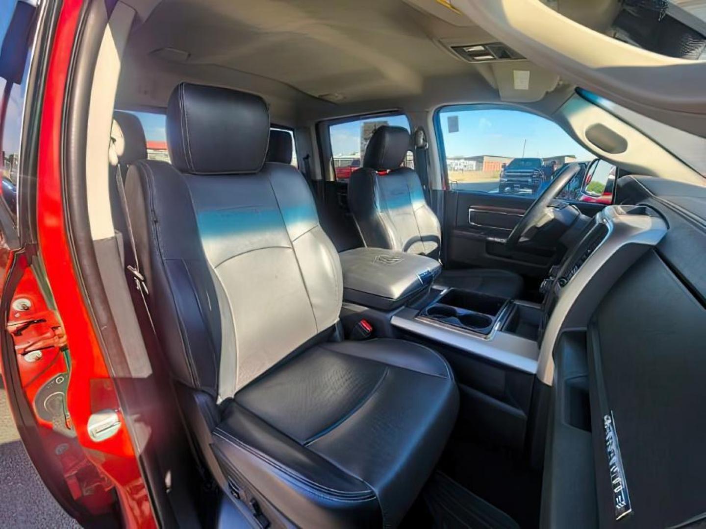 2014 RED /BLACK RAM 1500 LARAMIE (1C6RR7NT4ES) with an 5.7 engine, AUTOMATIC transmission, located at 1235 N Woodruff Ave., Idaho Falls, 83401, (208) 523-1053, 43.507172, -112.000488 - At Timberline Auto, finding a great deal on your next vehicle is always easy! Our experienced sales staff's goal is to help find you the right vehicle at the right price! Our knowledgeable finance department has options for almost any credit score. We offer extended service contract options to prote - Photo#17