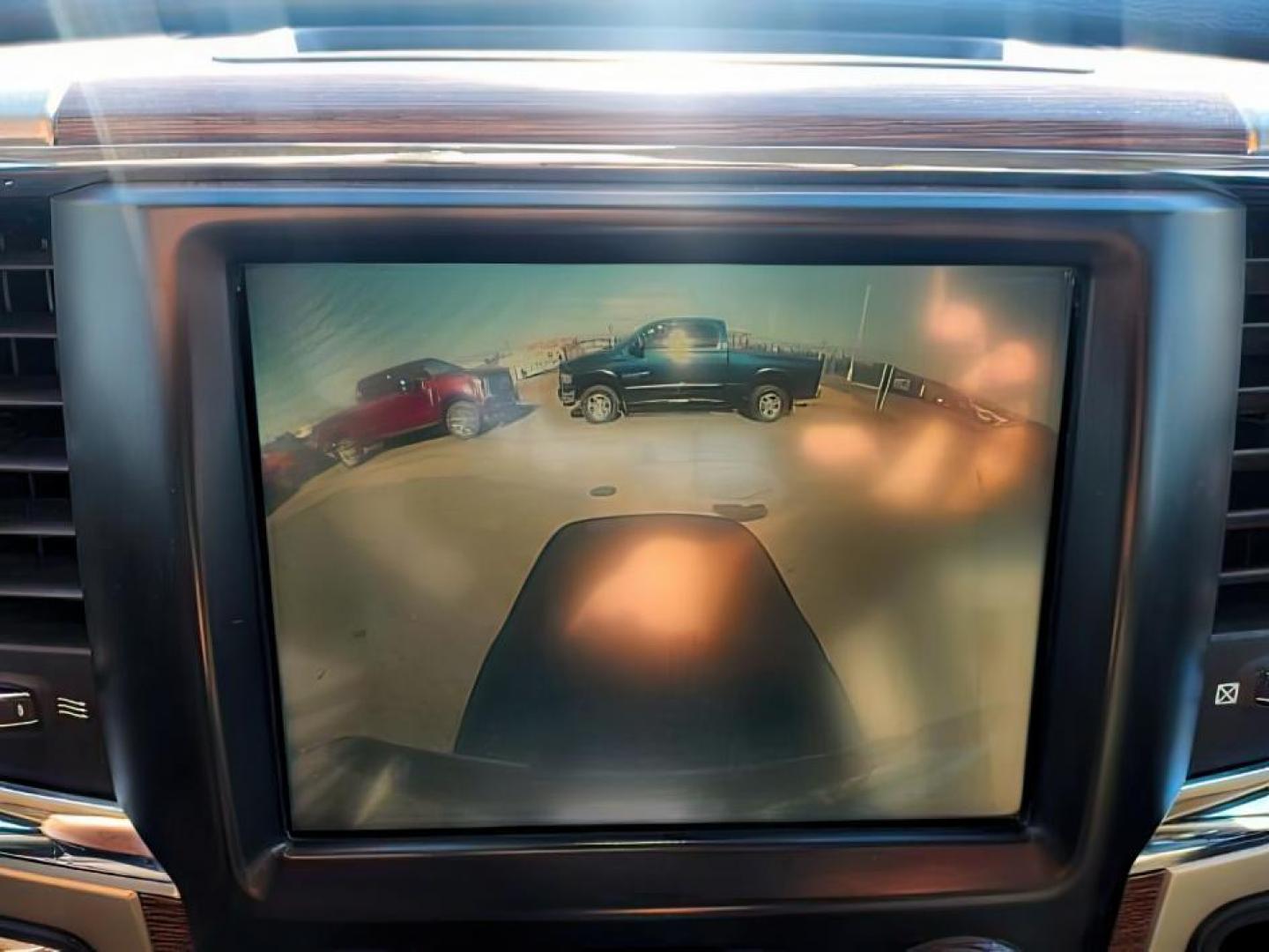 2014 RED /BLACK RAM 1500 LARAMIE (1C6RR7NT4ES) with an 5.7 engine, AUTOMATIC transmission, located at 1235 N Woodruff Ave., Idaho Falls, 83401, (208) 523-1053, 43.507172, -112.000488 - At Timberline Auto, finding a great deal on your next vehicle is always easy! Our experienced sales staff's goal is to help find you the right vehicle at the right price! Our knowledgeable finance department has options for almost any credit score. We offer extended service contract options to prote - Photo#20