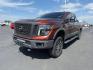 2016 Forged Copper /Black/Brown Nissan TITAN XD (1N6BA1F40GN) with an 5L V-8 diesel direct injection engine, Automatic transmission, located at 1175 N Woodruff Ave, Idaho Falls, ID, 83401, 43.506901, -111.999657 - At Timberline Auto, finding a great deal on your next vehicle is always easy! Our experienced sales staff's goal is to help find you the right vehicle at the right price! Our knowledgeable finance department has options for almost any credit score. We offer extended service contract options to prote - Photo#1
