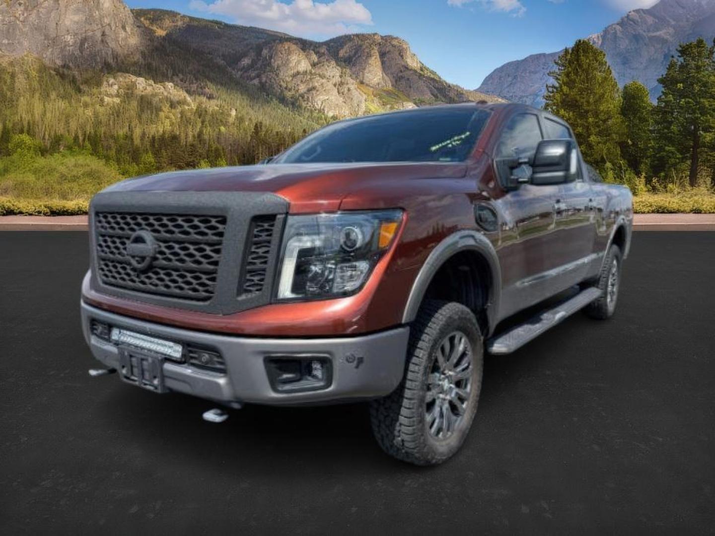 2016 Forged Copper /Black/Brown Nissan TITAN XD (1N6BA1F40GN) with an 5L V-8 diesel direct injection engine, Automatic transmission, located at 1175 N Woodruff Ave, Idaho Falls, ID, 83401, 43.506901, -111.999657 - At Timberline Auto, finding a great deal on your next vehicle is always easy! Our experienced sales staff's goal is to help find you the right vehicle at the right price! Our knowledgeable finance department has options for almost any credit score. We offer extended service contract options to prote - Photo#0