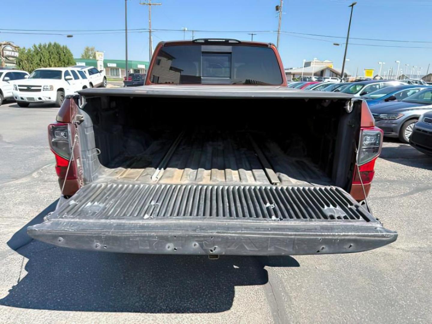 2016 Forged Copper /Black/Brown Nissan TITAN XD (1N6BA1F40GN) with an 5L V-8 diesel direct injection engine, Automatic transmission, located at 1175 N Woodruff Ave, Idaho Falls, ID, 83401, 43.506901, -111.999657 - At Timberline Auto, finding a great deal on your next vehicle is always easy! Our experienced sales staff's goal is to help find you the right vehicle at the right price! Our knowledgeable finance department has options for almost any credit score. We offer extended service contract options to prote - Photo#5
