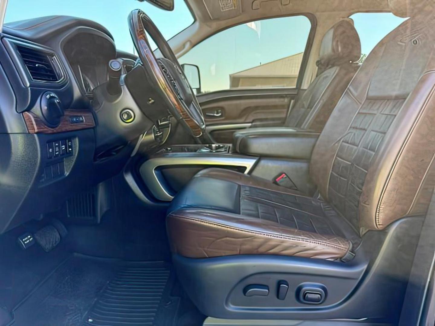 2016 Forged Copper /Black/Brown Nissan TITAN XD (1N6BA1F40GN) with an 5L V-8 diesel direct injection engine, Automatic transmission, located at 1175 N Woodruff Ave, Idaho Falls, ID, 83401, 43.506901, -111.999657 - At Timberline Auto, finding a great deal on your next vehicle is always easy! Our experienced sales staff's goal is to help find you the right vehicle at the right price! Our knowledgeable finance department has options for almost any credit score. We offer extended service contract options to prote - Photo#12