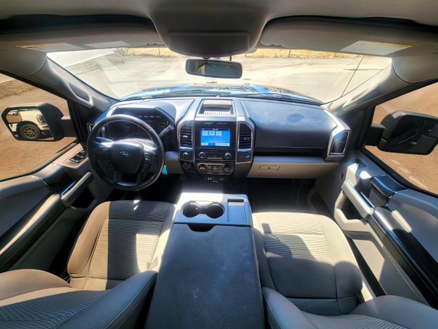 2016 Blue Jeans Metallic /Medium Earth Gray Ford F-150 (1FTEW1EG1GK) with an 35L V-6 DOHC engine, Automatic transmission, located at 1175 N Woodruff Ave, Idaho Falls, ID, 83401, 43.506901, -111.999657 - At Timberline Auto, finding a great deal on your next vehicle is always easy! Our experienced sales staff's goal is to help find you the right vehicle at the right price! Our knowledgeable finance department has options for almost any credit score. We offer extended service contract options to prote - Photo#8