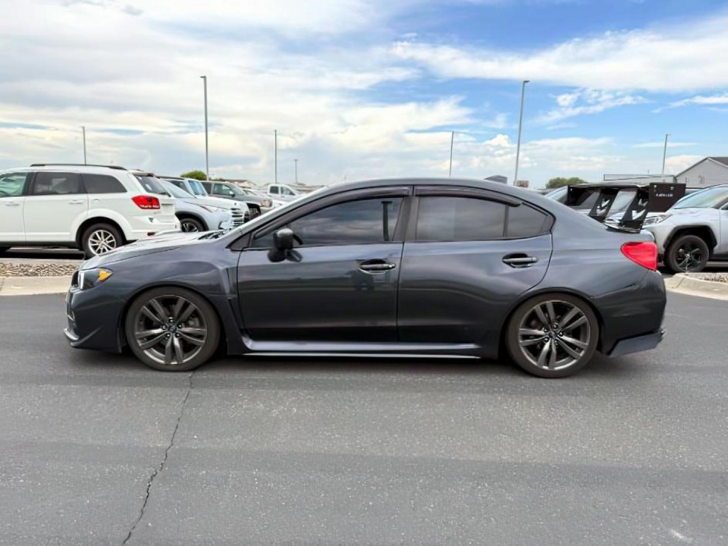 2017 Dark Gray Metallic /Carbon Black Subaru WRX (JF1VA1E60H8) with an 2L H-4 gasoline direct injection engine, Automatic transmission, located at 1175 N Woodruff Ave, Idaho Falls, ID, 83401, 43.506901, -111.999657 - At Timberline Auto, finding a great deal on your next vehicle is always easy! Our experienced sales staff's goal is to help find you the right vehicle at the right price! Our knowledgeable finance department has options for almost any credit score. We offer extended service contract options to prote - Photo#1