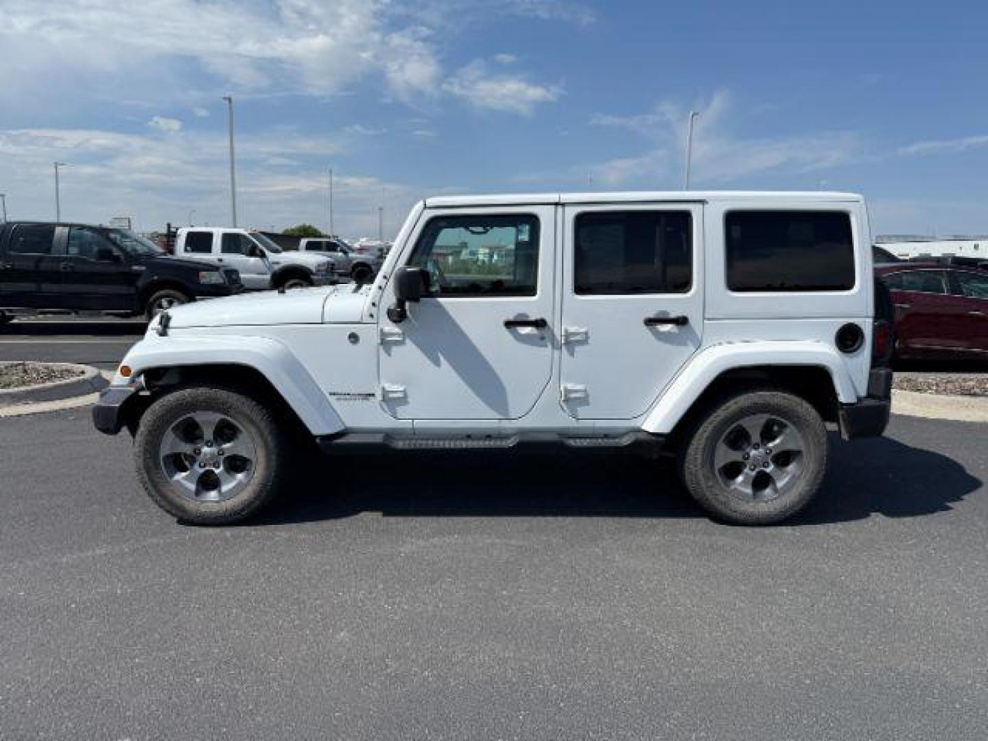 2018 Bright White Clearcoat /Dark Saddle/Black Jeep Wrangler JK Unlimited (1C4BJWEG8JL) with an Pentastar 36L V-6 DOHC engine, Automatic transmission, located at 1175 N Woodruff Ave, Idaho Falls, ID, 83401, 43.506901, -111.999657 - At Timberline Auto, finding a great deal on your next vehicle is always easy! Our experienced sales staff's goal is to help find you the right vehicle at the right price! Our knowledgeable finance department has options for almost any credit score. We offer extended service contract options to prote - Photo#1