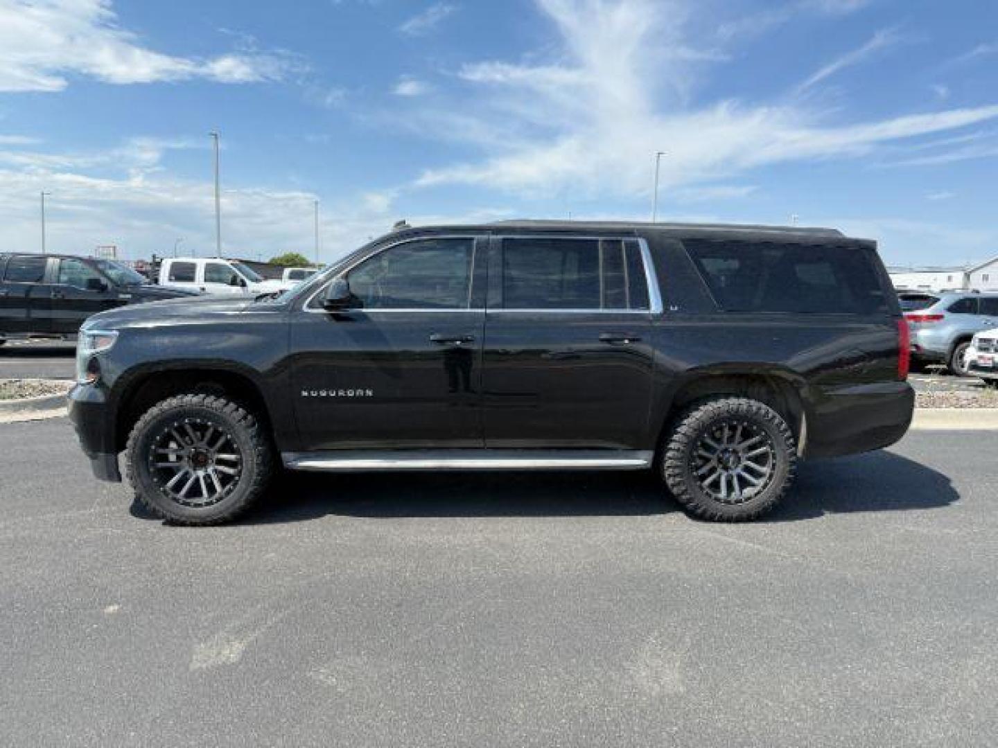2015 Black /Jet Black Chevrolet Suburban 1500 LT (1GNSKJKC1FR) with an EcoTec3 5.3L V-8 gasoline direct injection engine, AUTOMATIC transmission, located at 1235 N Woodruff Ave., Idaho Falls, 83401, (208) 523-1053, 43.507172, -112.000488 - At Timberline Auto, finding a great deal on your next vehicle is always easy! Our experienced sales staff's goal is to help find you the right vehicle at the right price! Our knowledgeable finance department has options for almost any credit score. We offer extended service contract options to prote - Photo#1