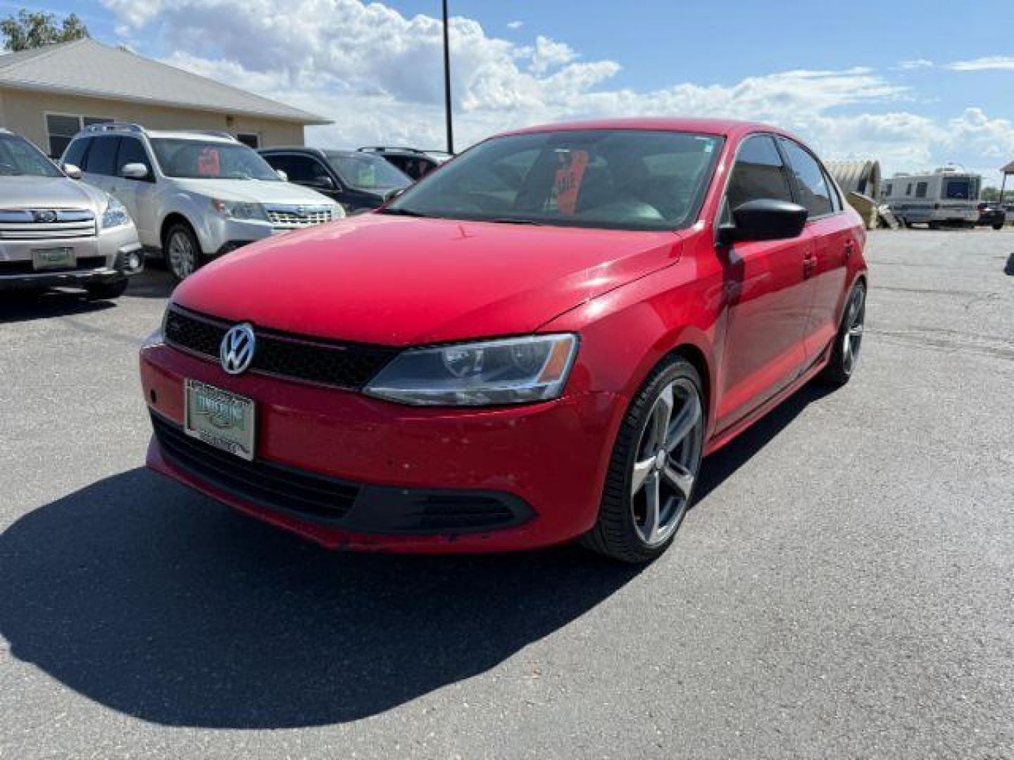 2014 Tornado Red /Titan Black Volkswagen Jetta (3VW2K7AJ5EM) with an 2L I-4 regular unleaded engine, Automatic transmission, located at 1175 N Woodruff Ave, Idaho Falls, ID, 83401, 43.506901, -111.999657 - At Timberline Auto, finding a great deal on your next vehicle is always easy! Our experienced sales staff's goal is to help find you the right vehicle at the right price! Our knowledgeable finance department has options for almost any credit score. We offer extended service contract options to prote - Photo#19