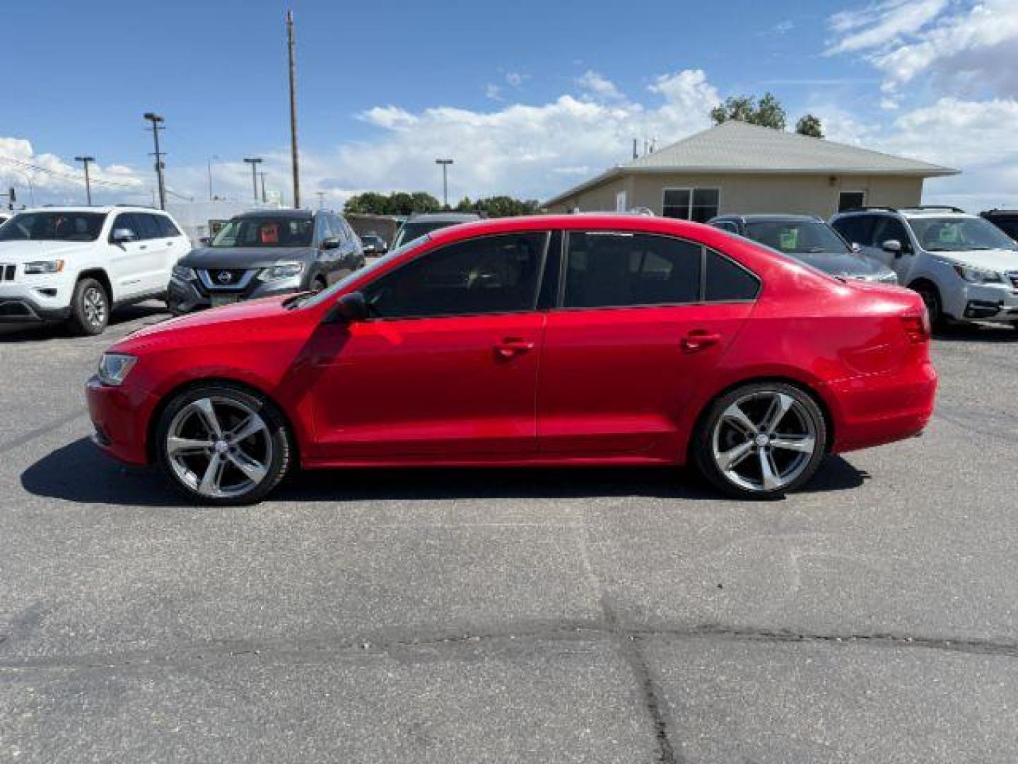 2014 Tornado Red /Titan Black Volkswagen Jetta (3VW2K7AJ5EM) with an 2L I-4 regular unleaded engine, Automatic transmission, located at 1175 N Woodruff Ave, Idaho Falls, ID, 83401, 43.506901, -111.999657 - At Timberline Auto, finding a great deal on your next vehicle is always easy! Our experienced sales staff's goal is to help find you the right vehicle at the right price! Our knowledgeable finance department has options for almost any credit score. We offer extended service contract options to prote - Photo#20