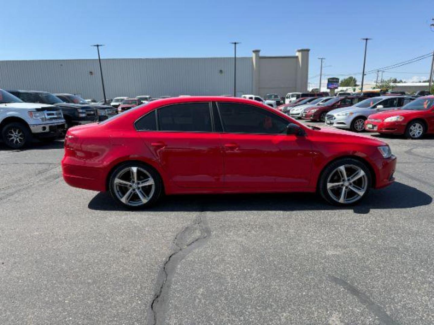 2014 Tornado Red /Titan Black Volkswagen Jetta (3VW2K7AJ5EM) with an 2L I-4 regular unleaded engine, Automatic transmission, located at 1175 N Woodruff Ave, Idaho Falls, ID, 83401, 43.506901, -111.999657 - At Timberline Auto, finding a great deal on your next vehicle is always easy! Our experienced sales staff's goal is to help find you the right vehicle at the right price! Our knowledgeable finance department has options for almost any credit score. We offer extended service contract options to prote - Photo#24