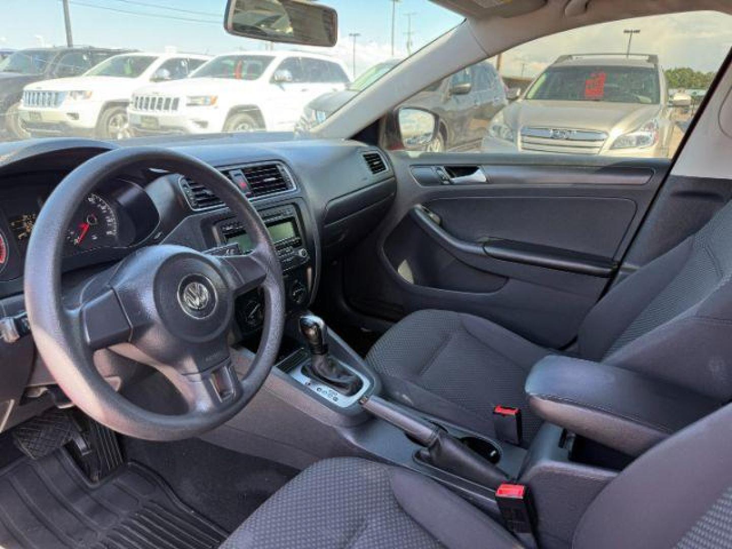2014 Tornado Red /Titan Black Volkswagen Jetta (3VW2K7AJ5EM) with an 2L I-4 regular unleaded engine, Automatic transmission, located at 1175 N Woodruff Ave, Idaho Falls, ID, 83401, 43.506901, -111.999657 - At Timberline Auto, finding a great deal on your next vehicle is always easy! Our experienced sales staff's goal is to help find you the right vehicle at the right price! Our knowledgeable finance department has options for almost any credit score. We offer extended service contract options to prote - Photo#30