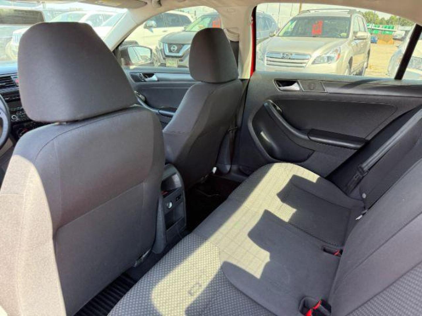 2014 Tornado Red /Titan Black Volkswagen Jetta (3VW2K7AJ5EM) with an 2L I-4 regular unleaded engine, Automatic transmission, located at 1175 N Woodruff Ave, Idaho Falls, ID, 83401, 43.506901, -111.999657 - At Timberline Auto, finding a great deal on your next vehicle is always easy! Our experienced sales staff's goal is to help find you the right vehicle at the right price! Our knowledgeable finance department has options for almost any credit score. We offer extended service contract options to prote - Photo#36