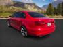 2014 Tornado Red /Titan Black Volkswagen Jetta (3VW2K7AJ5EM) with an 2L I-4 regular unleaded engine, Automatic transmission, located at 1175 N Woodruff Ave, Idaho Falls, ID, 83401, 43.506901, -111.999657 - At Timberline Auto, finding a great deal on your next vehicle is always easy! Our experienced sales staff's goal is to help find you the right vehicle at the right price! Our knowledgeable finance department has options for almost any credit score. We offer extended service contract options to prote - Photo#2