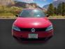 2014 Tornado Red /Titan Black Volkswagen Jetta (3VW2K7AJ5EM) with an 2L I-4 regular unleaded engine, Automatic transmission, located at 1175 N Woodruff Ave, Idaho Falls, ID, 83401, 43.506901, -111.999657 - At Timberline Auto, finding a great deal on your next vehicle is always easy! Our experienced sales staff's goal is to help find you the right vehicle at the right price! Our knowledgeable finance department has options for almost any credit score. We offer extended service contract options to prote - Photo#7