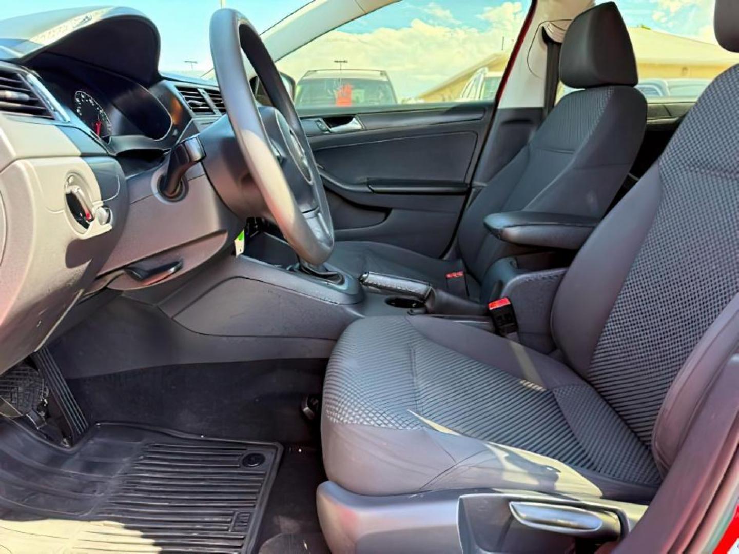2014 Tornado Red /Titan Black Volkswagen Jetta (3VW2K7AJ5EM) with an 2L I-4 regular unleaded engine, Automatic transmission, located at 1175 N Woodruff Ave, Idaho Falls, ID, 83401, 43.506901, -111.999657 - At Timberline Auto, finding a great deal on your next vehicle is always easy! Our experienced sales staff's goal is to help find you the right vehicle at the right price! Our knowledgeable finance department has options for almost any credit score. We offer extended service contract options to prote - Photo#10