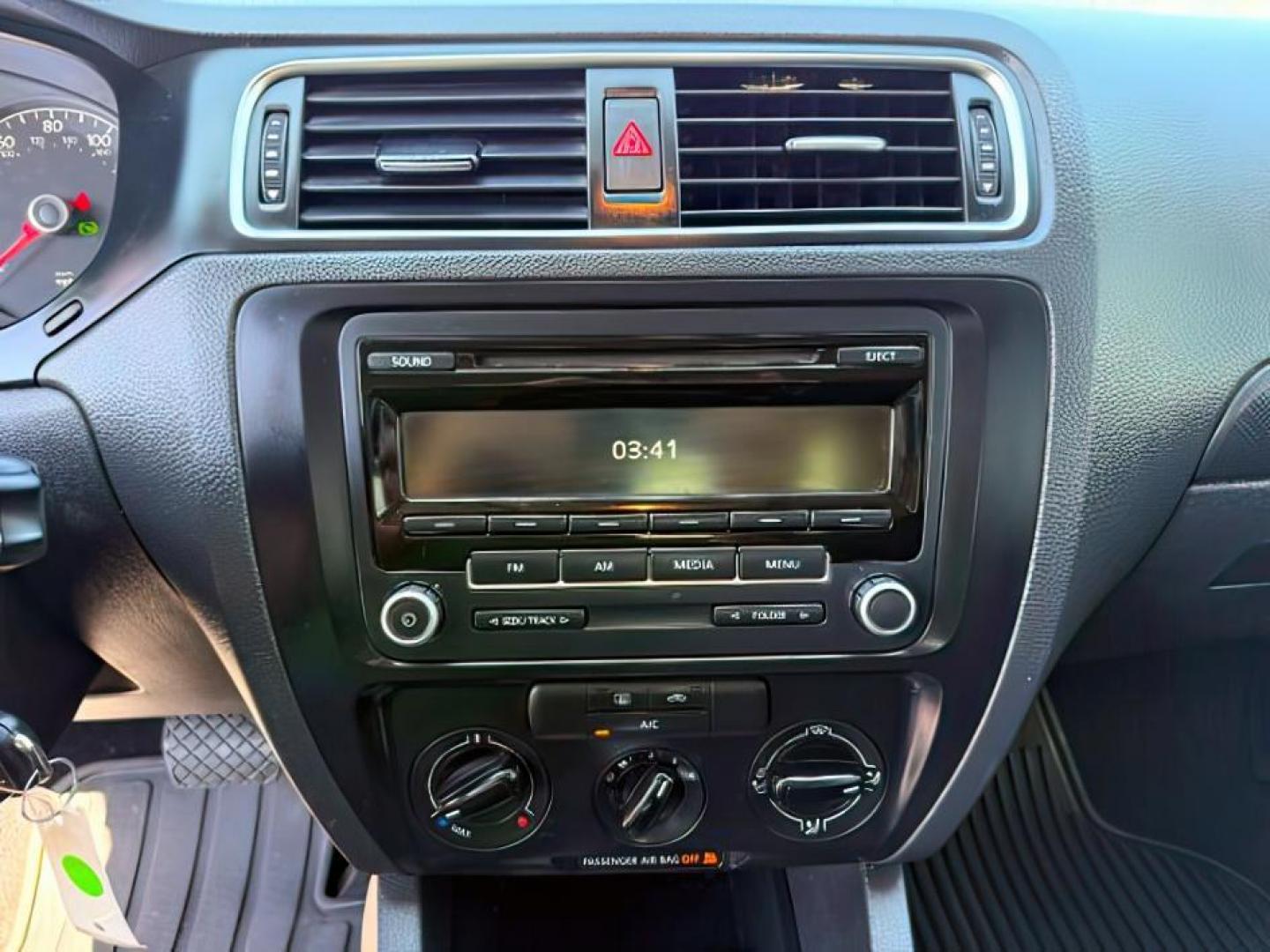 2014 Tornado Red /Titan Black Volkswagen Jetta (3VW2K7AJ5EM) with an 2L I-4 regular unleaded engine, Automatic transmission, located at 1175 N Woodruff Ave, Idaho Falls, ID, 83401, 43.506901, -111.999657 - At Timberline Auto, finding a great deal on your next vehicle is always easy! Our experienced sales staff's goal is to help find you the right vehicle at the right price! Our knowledgeable finance department has options for almost any credit score. We offer extended service contract options to prote - Photo#13