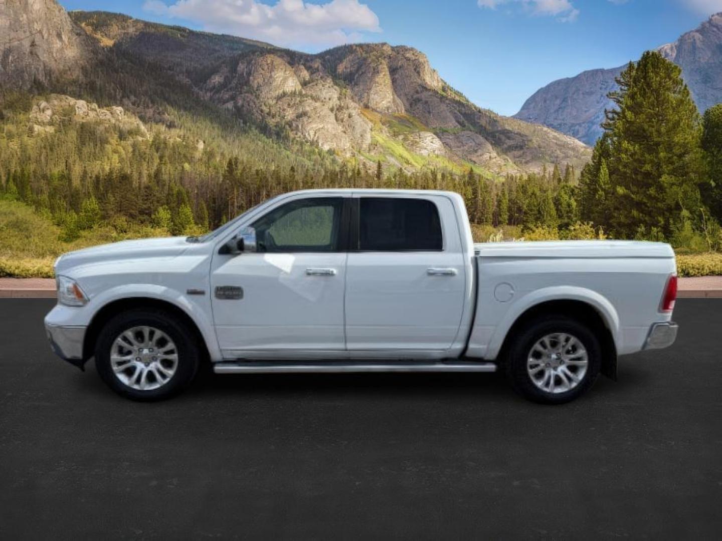 2013 WHITE /LEATHER RAM 1500 LARAMIE LONGHORN (1C6RR7PTXDS) with an 5.7 V8 engine, AUTO transmission, located at 1235 N Woodruff Ave., Idaho Falls, 83401, (208) 523-1053, 43.507172, -112.000488 - At Timberline Auto, finding a great deal on your next vehicle is always easy! Our experienced sales staff's goal is to help find you the right vehicle at the right price! Our knowledgeable finance department has options for almost any credit score. We offer extended service contract options to prote - Photo#1