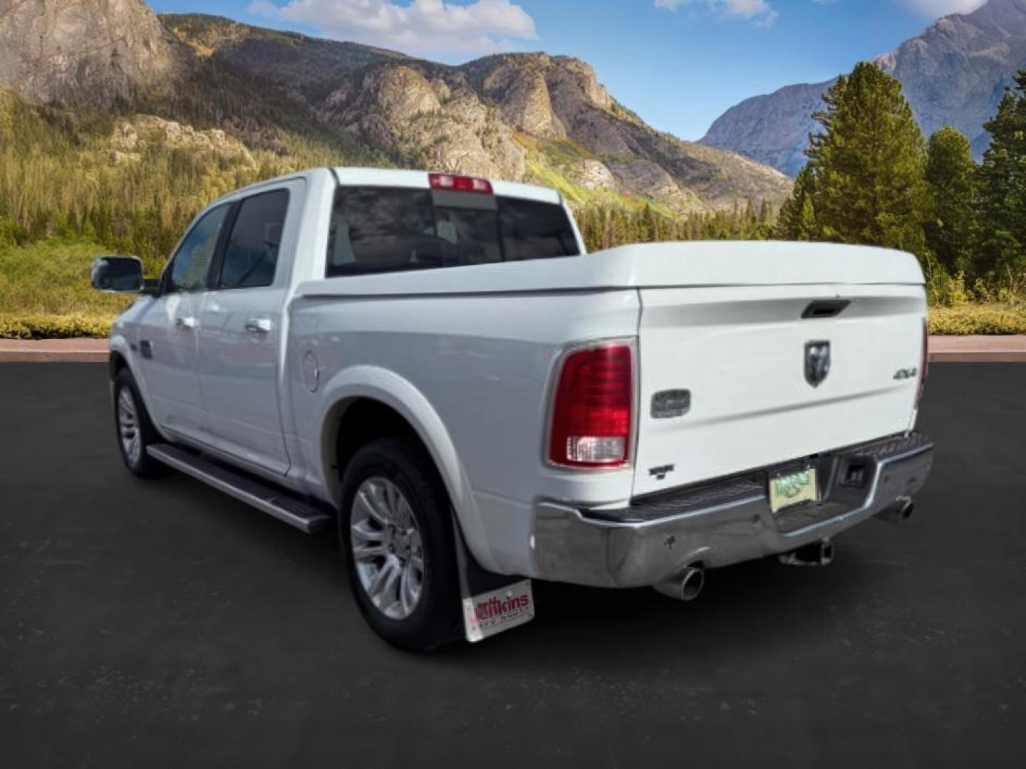 2013 WHITE /LEATHER RAM 1500 LARAMIE LONGHORN (1C6RR7PTXDS) with an 5.7 V8 engine, AUTO transmission, located at 1235 N Woodruff Ave., Idaho Falls, 83401, (208) 523-1053, 43.507172, -112.000488 - At Timberline Auto, finding a great deal on your next vehicle is always easy! Our experienced sales staff's goal is to help find you the right vehicle at the right price! Our knowledgeable finance department has options for almost any credit score. We offer extended service contract options to prote - Photo#2