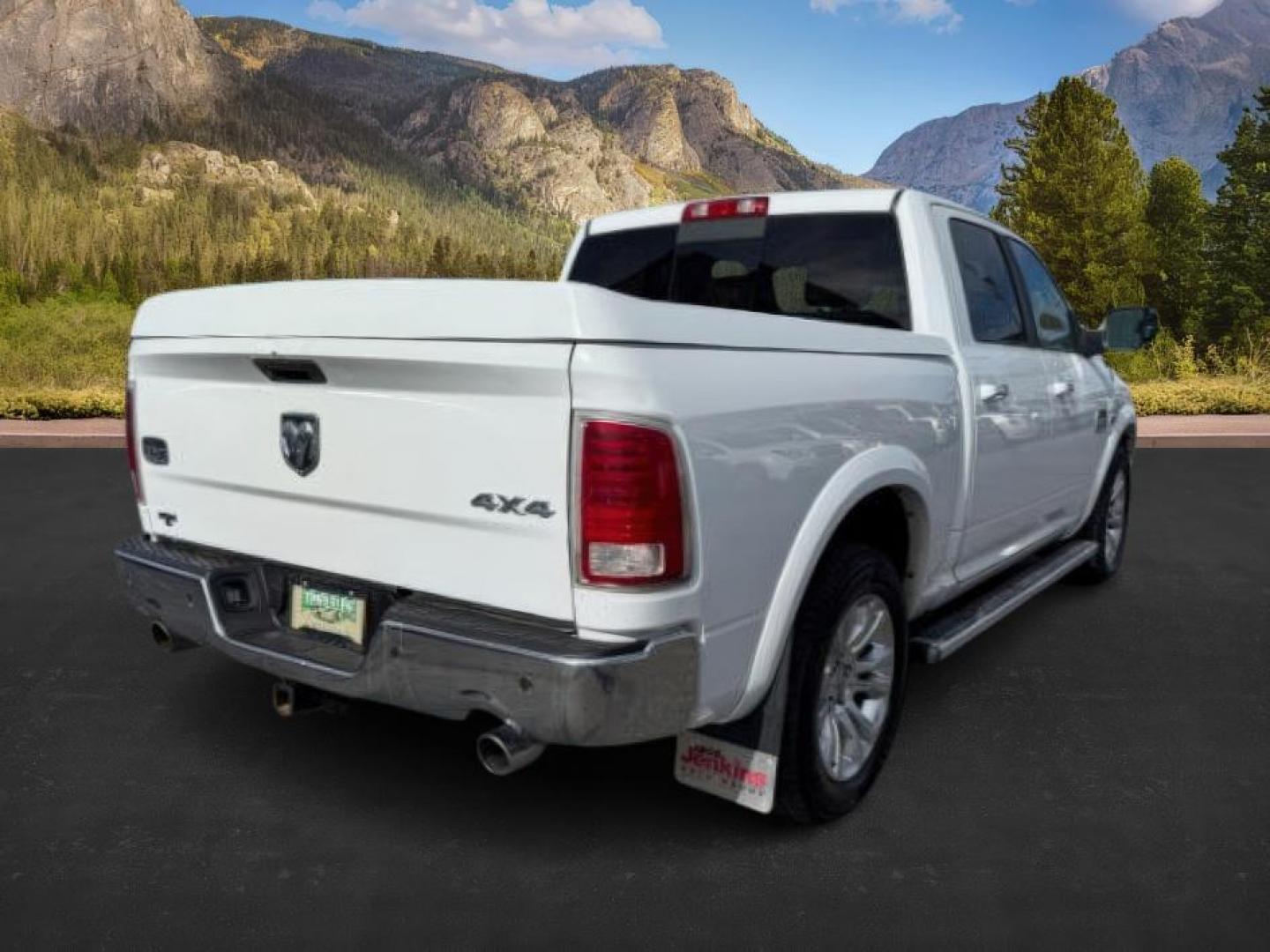 2013 WHITE /LEATHER RAM 1500 LARAMIE LONGHORN (1C6RR7PTXDS) with an 5.7 V8 engine, AUTO transmission, located at 1235 N Woodruff Ave., Idaho Falls, 83401, (208) 523-1053, 43.507172, -112.000488 - At Timberline Auto, finding a great deal on your next vehicle is always easy! Our experienced sales staff's goal is to help find you the right vehicle at the right price! Our knowledgeable finance department has options for almost any credit score. We offer extended service contract options to prote - Photo#4