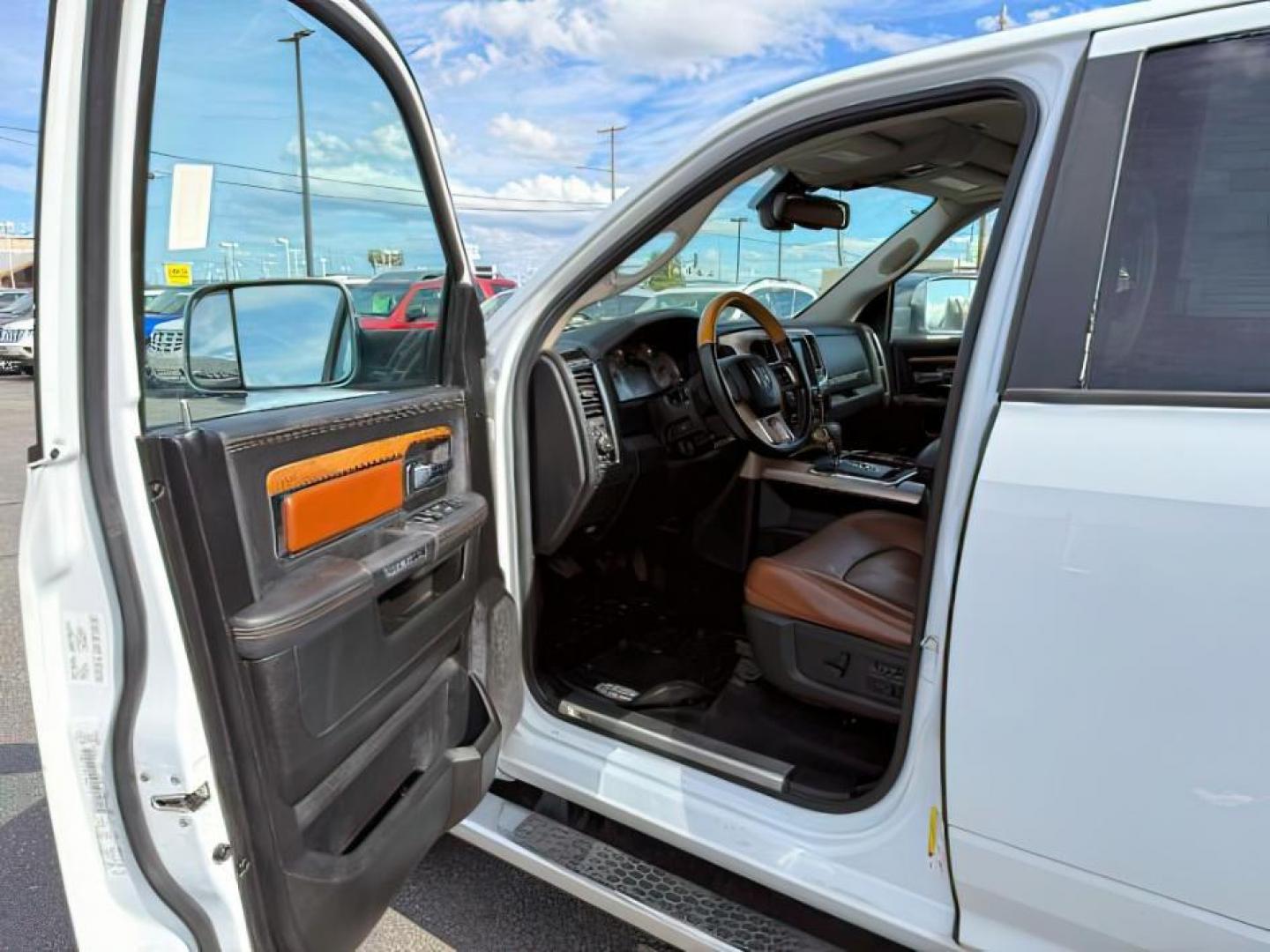 2013 WHITE /LEATHER RAM 1500 LARAMIE LONGHORN (1C6RR7PTXDS) with an 5.7 V8 engine, AUTO transmission, located at 1235 N Woodruff Ave., Idaho Falls, 83401, (208) 523-1053, 43.507172, -112.000488 - At Timberline Auto, finding a great deal on your next vehicle is always easy! Our experienced sales staff's goal is to help find you the right vehicle at the right price! Our knowledgeable finance department has options for almost any credit score. We offer extended service contract options to prote - Photo#9