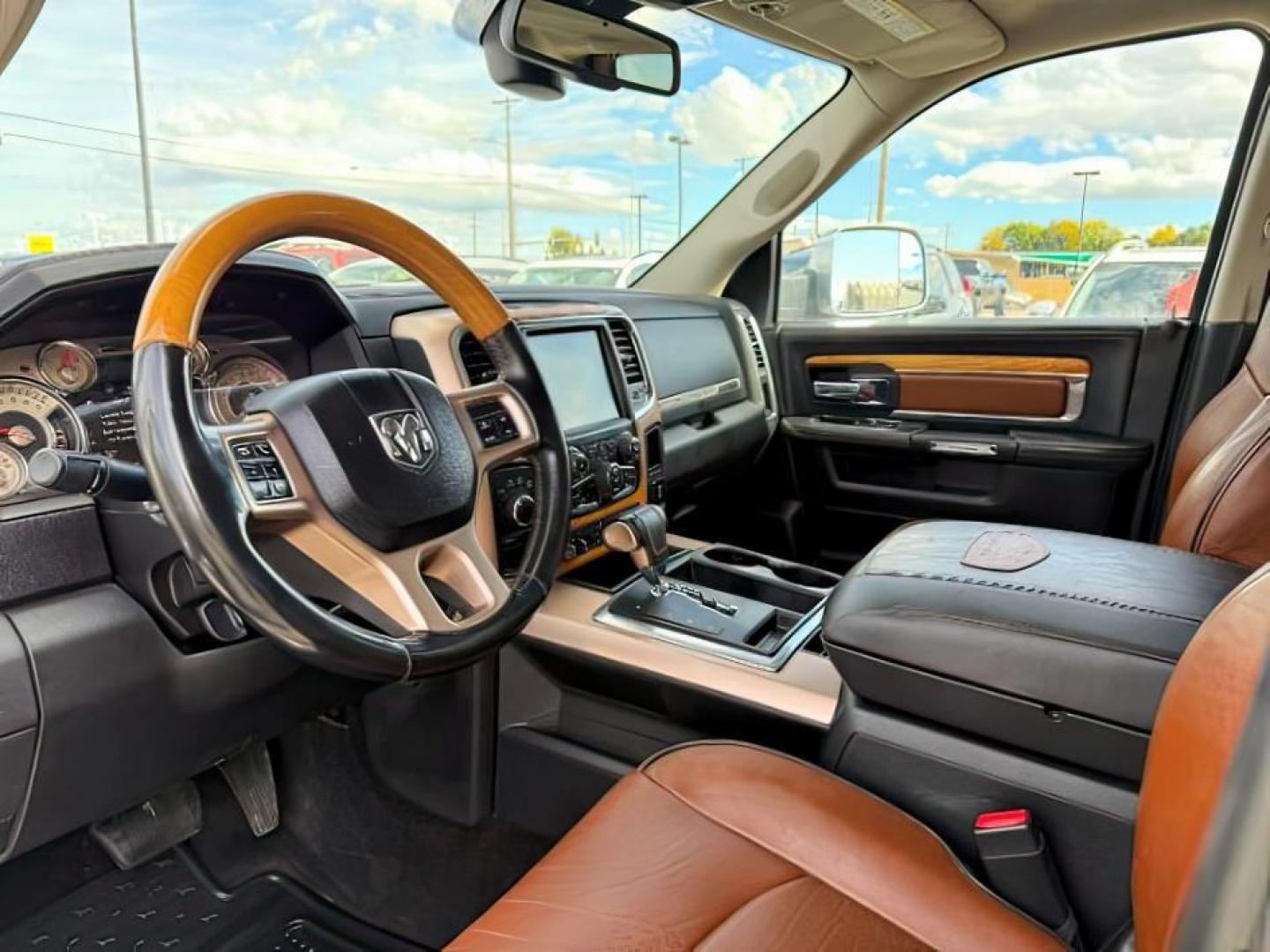 2013 WHITE /LEATHER RAM 1500 LARAMIE LONGHORN (1C6RR7PTXDS) with an 5.7 V8 engine, AUTO transmission, located at 1235 N Woodruff Ave., Idaho Falls, 83401, (208) 523-1053, 43.507172, -112.000488 - At Timberline Auto, finding a great deal on your next vehicle is always easy! Our experienced sales staff's goal is to help find you the right vehicle at the right price! Our knowledgeable finance department has options for almost any credit score. We offer extended service contract options to prote - Photo#11