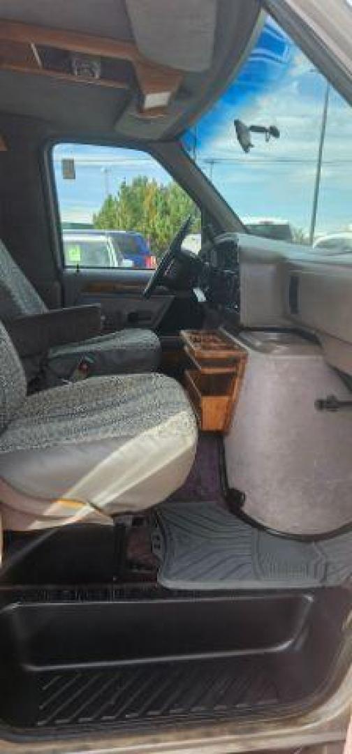 1995 TAN /CLOTH Ford E-150 (1FDEE14H4SH) with an 58 engine, Automatic transmission, located at 1175 N Woodruff Ave, Idaho Falls, ID, 83401, 43.506901, -111.999657 - At Timberline Auto, finding a great deal on your next vehicle is always easy! Our experienced sales staff's goal is to help find you the right vehicle at the right price! Our knowledgeable finance department has options for almost any credit score. We offer extended service contract options to prote - Photo#23