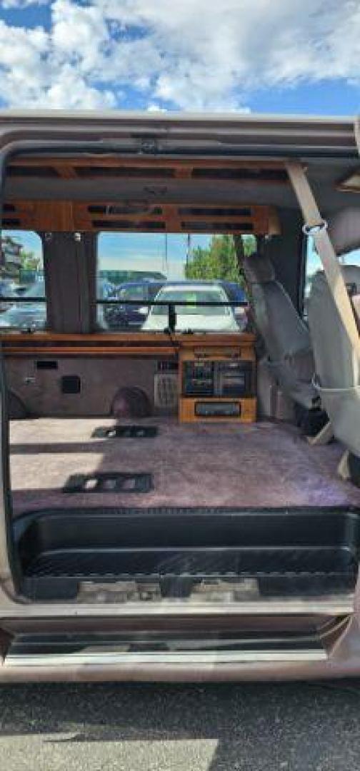1995 TAN /CLOTH Ford E-150 (1FDEE14H4SH) with an 58 engine, Automatic transmission, located at 1175 N Woodruff Ave, Idaho Falls, ID, 83401, 43.506901, -111.999657 - At Timberline Auto, finding a great deal on your next vehicle is always easy! Our experienced sales staff's goal is to help find you the right vehicle at the right price! Our knowledgeable finance department has options for almost any credit score. We offer extended service contract options to prote - Photo#24