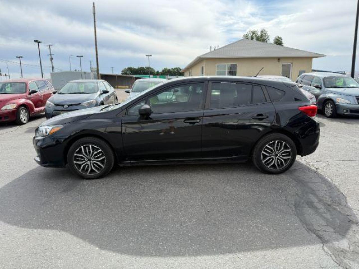 2018 Crystal Black Silica /Black Subaru Impreza (4S3GTAA61J1) with an 2L H-4 gasoline direct injection engine, Manual transmission, located at 1175 N Woodruff Ave, Idaho Falls, ID, 83401, 43.506901, -111.999657 - At Timberline Auto, finding a great deal on your next vehicle is always easy! Our experienced sales staff's goal is to help find you the right vehicle at the right price! Our knowledgeable finance department has options for almost any credit score. We offer extended service contract options to prote - Photo#17
