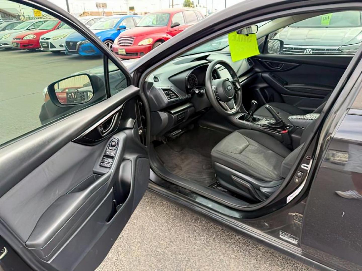 2018 Crystal Black Silica /Black Subaru Impreza (4S3GTAA61J1) with an 2L H-4 gasoline direct injection engine, Manual transmission, located at 1175 N Woodruff Ave, Idaho Falls, ID, 83401, 43.506901, -111.999657 - At Timberline Auto, finding a great deal on your next vehicle is always easy! Our experienced sales staff's goal is to help find you the right vehicle at the right price! Our knowledgeable finance department has options for almost any credit score. We offer extended service contract options to prote - Photo#9