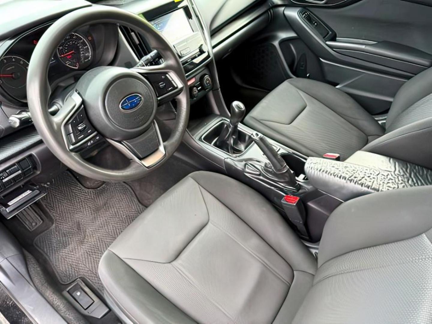 2018 Crystal Black Silica /Black Subaru Impreza (4S3GTAA61J1) with an 2L H-4 gasoline direct injection engine, Manual transmission, located at 1175 N Woodruff Ave, Idaho Falls, ID, 83401, 43.506901, -111.999657 - At Timberline Auto, finding a great deal on your next vehicle is always easy! Our experienced sales staff's goal is to help find you the right vehicle at the right price! Our knowledgeable finance department has options for almost any credit score. We offer extended service contract options to prote - Photo#11