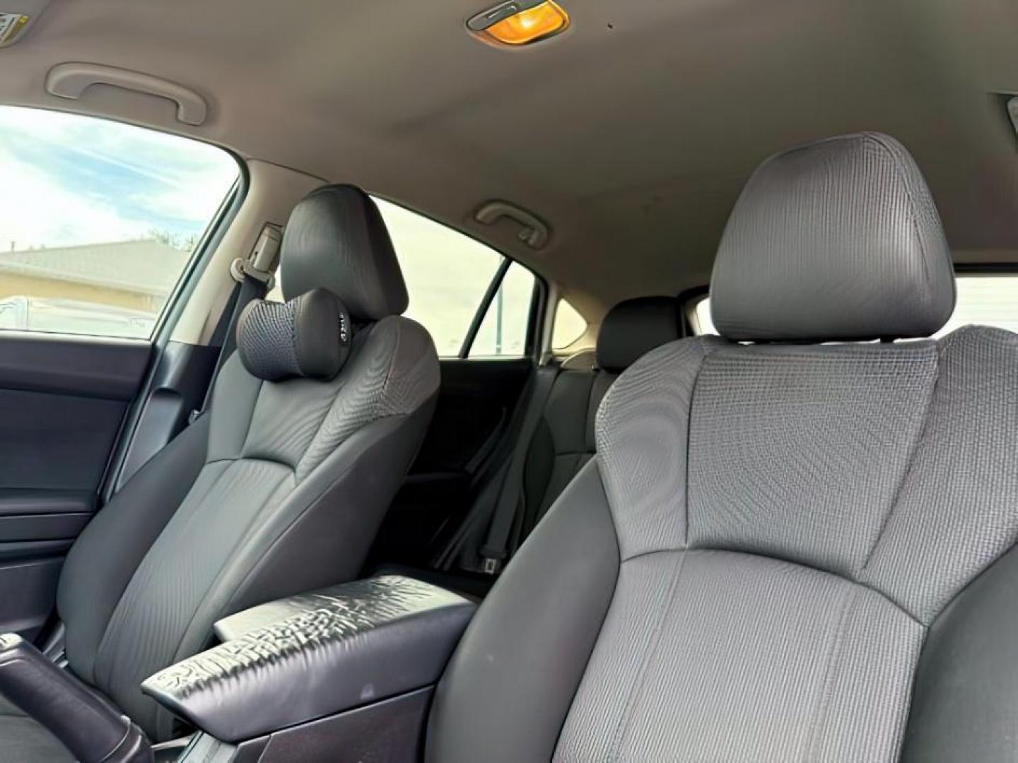 2018 Crystal Black Silica /Black Subaru Impreza (4S3GTAA61J1) with an 2L H-4 gasoline direct injection engine, Manual transmission, located at 1175 N Woodruff Ave, Idaho Falls, ID, 83401, 43.506901, -111.999657 - At Timberline Auto, finding a great deal on your next vehicle is always easy! Our experienced sales staff's goal is to help find you the right vehicle at the right price! Our knowledgeable finance department has options for almost any credit score. We offer extended service contract options to prote - Photo#14