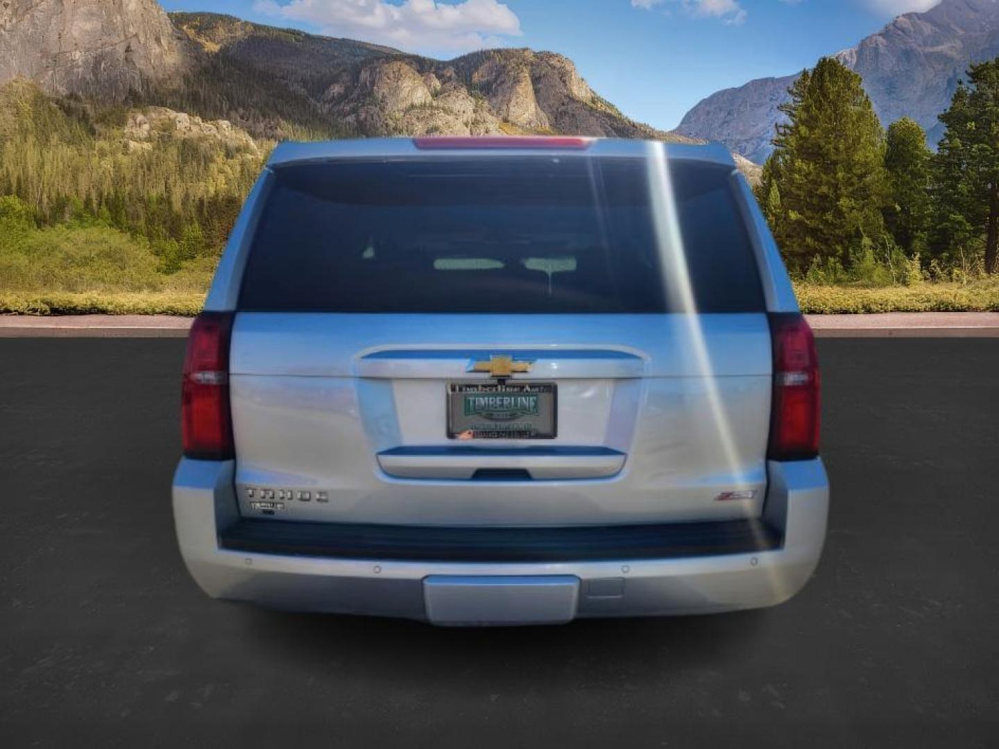 2016 Silver Ice Metallic /Jet Black Chevrolet Tahoe (1GNSKBKC4GR) with an EcoTec3 53L V-8 gasoline direct injection engine, Automatic transmission, located at 1175 N Woodruff Ave, Idaho Falls, ID, 83401, 43.506901, -111.999657 - At Timberline Auto, finding a great deal on your next vehicle is always easy! Our experienced sales staff's goal is to help find you the right vehicle at the right price! Our knowledgeable finance department has options for almost any credit score. We offer extended service contract options to prote - Photo#2